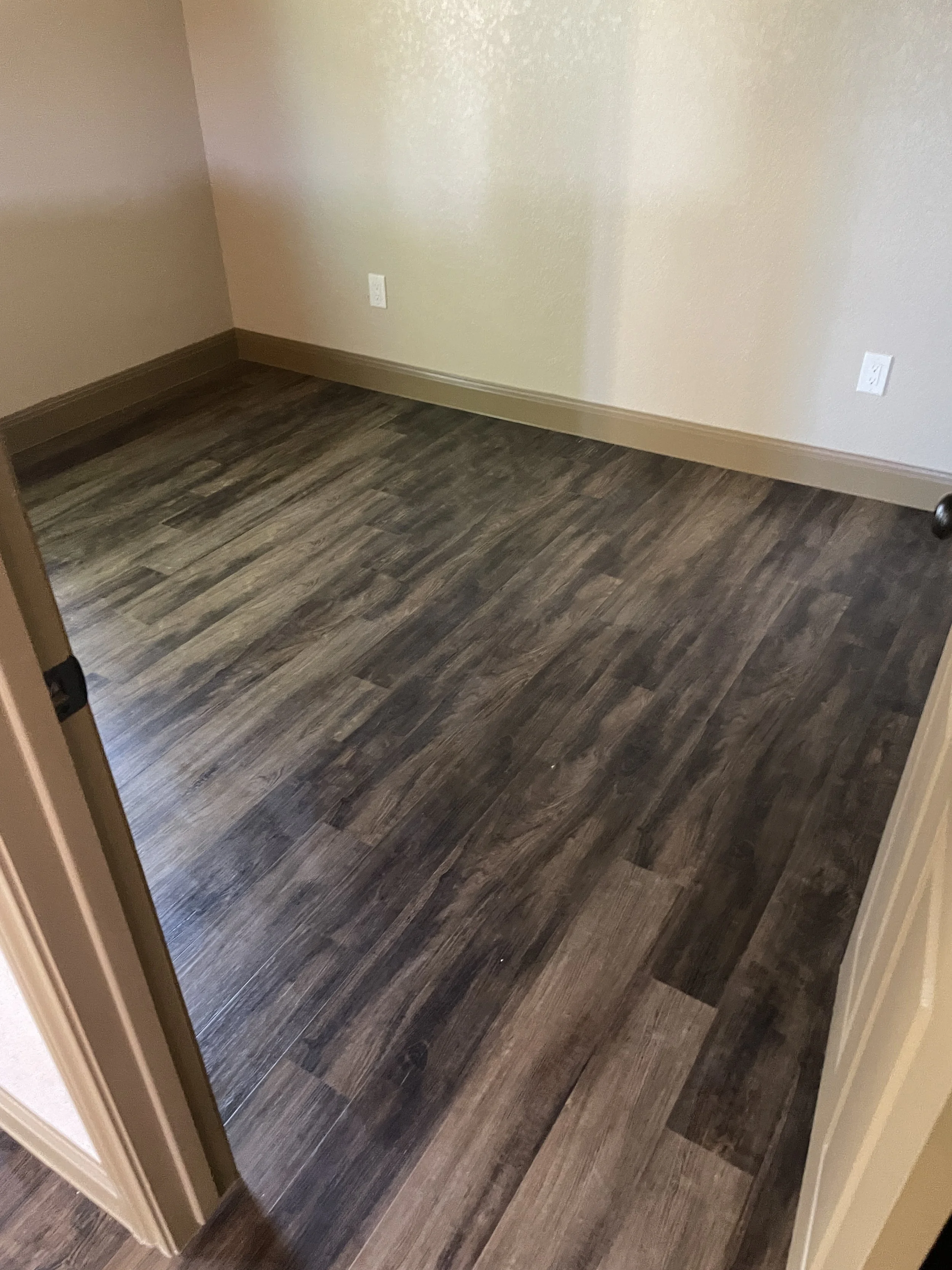 Cork Back Luxury Vinyl Plank (LVP) Installation – San Antonio

Cork back LVP flooring installation in a rich wood-look finish, bringing a durable and comfortable upgrade to the space. The cork backing adds extra sound absorption and a softer feel und