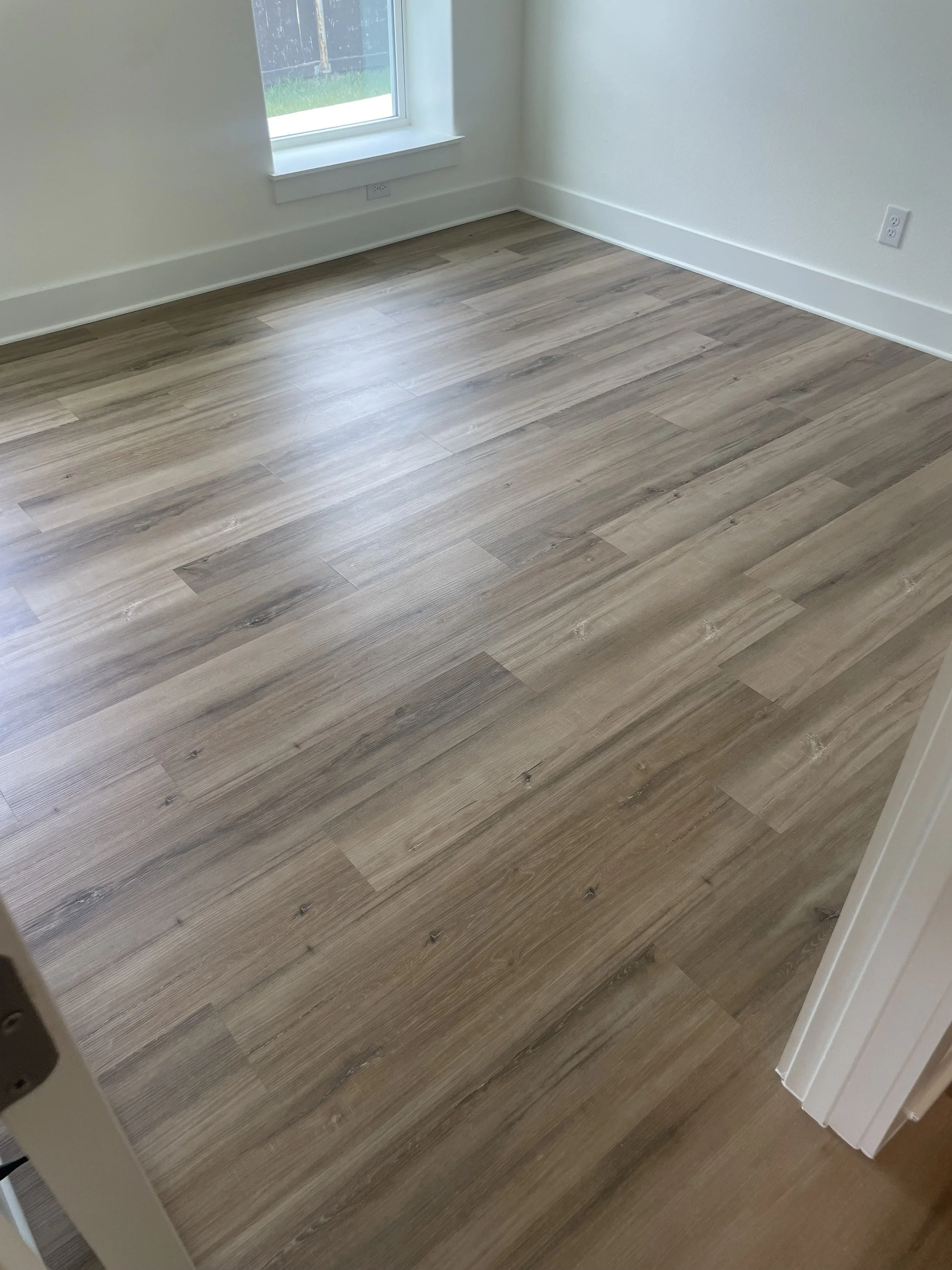 


Luxury Vinyl Plank (LVP) Flooring Installation – San Antonio

LVP flooring installation in a warm wood-look finish, bringing a modern and durable upgrade to the space. Installed wall-to-wall with clean baseboard transitions for a consistent and se