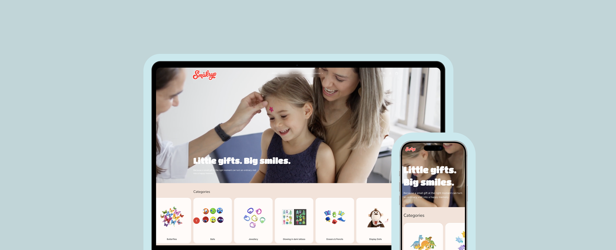 Screenshot of Smakryp website with the slogan 'Little gifts. Big smiles.' showing a process of face painting for a young girl, with a woman and a girl in the background, on a tablet and a phone.