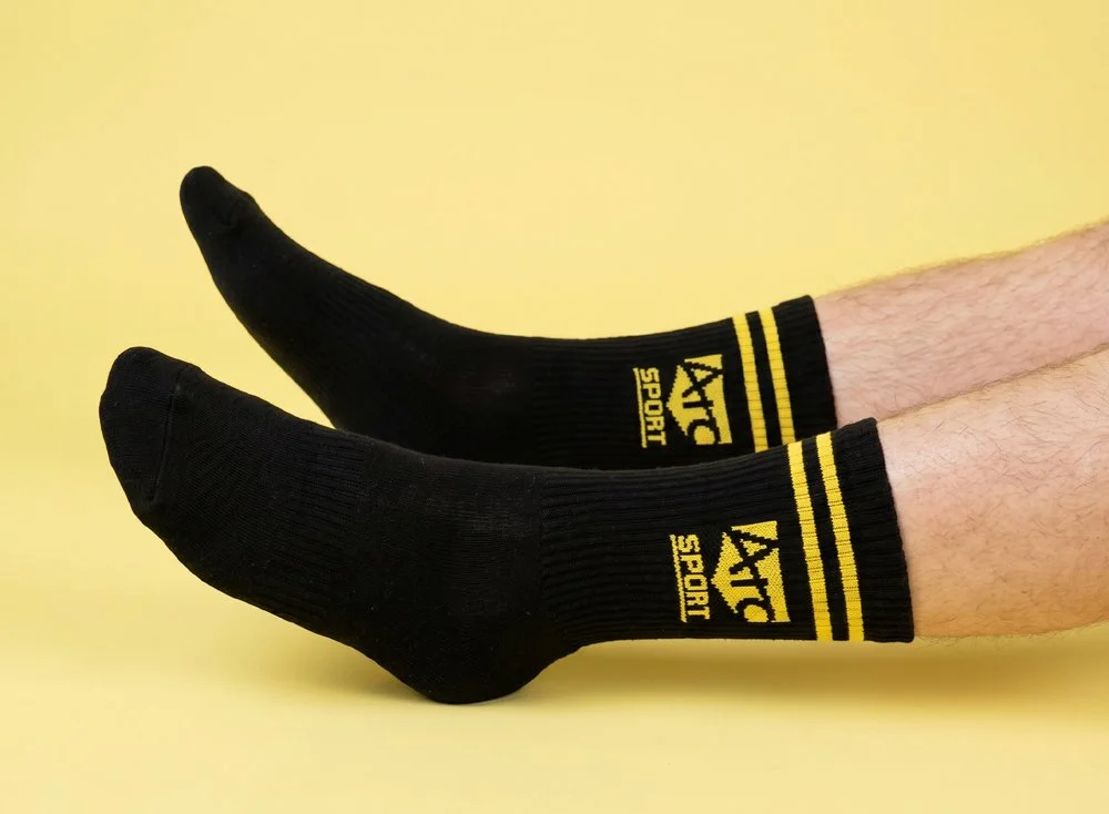 Black Sports Crew Socks with Yellow ARC logo on side
