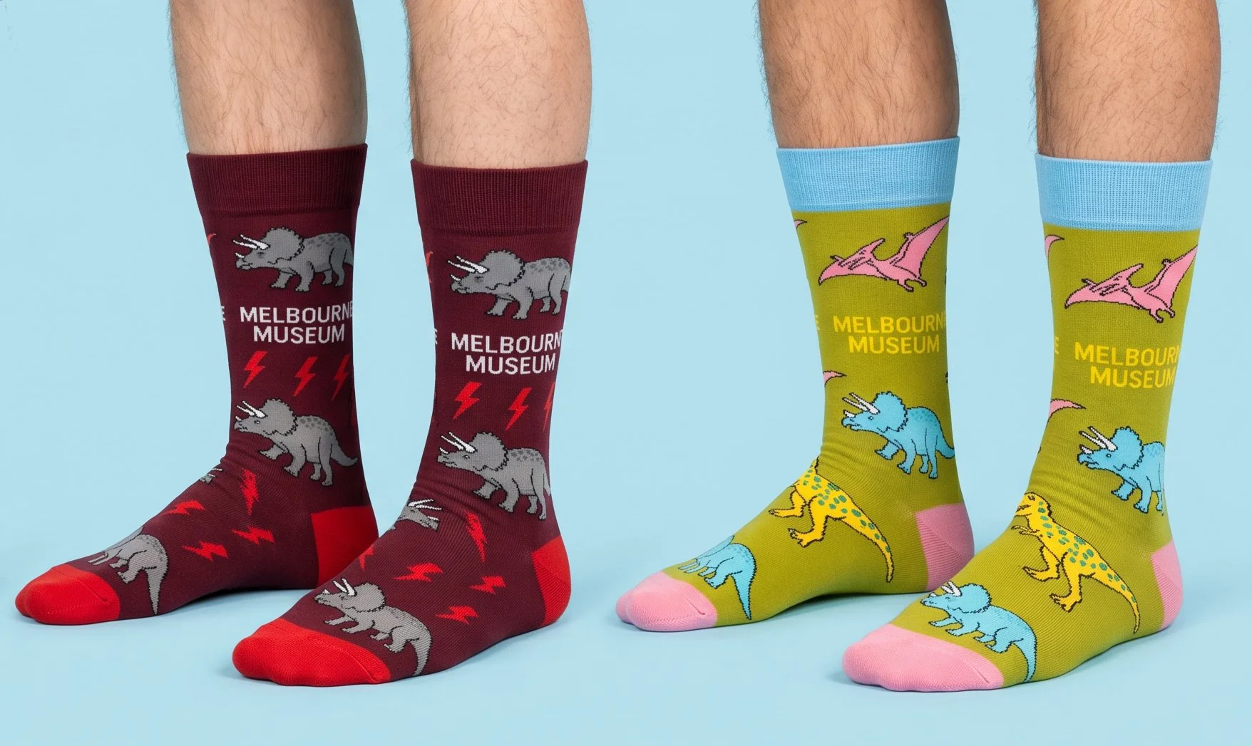 Custom dress socks with dinosaurs knitted onto them