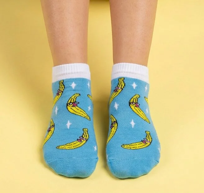 Custom cotton blue sports anklet socks with fun yellow banana design knitted in