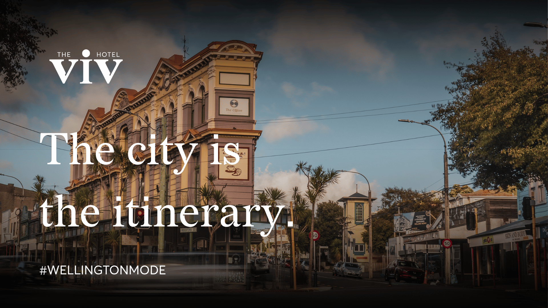 Historic building and streetscape in Wellington CBD promoting a city itinerary from The Viv Hotel.