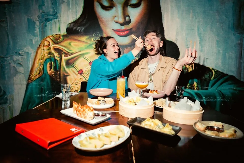 Guests enjoying food and cocktails during Visa Wellington On a Plate at Chow restaurant in Wellington.