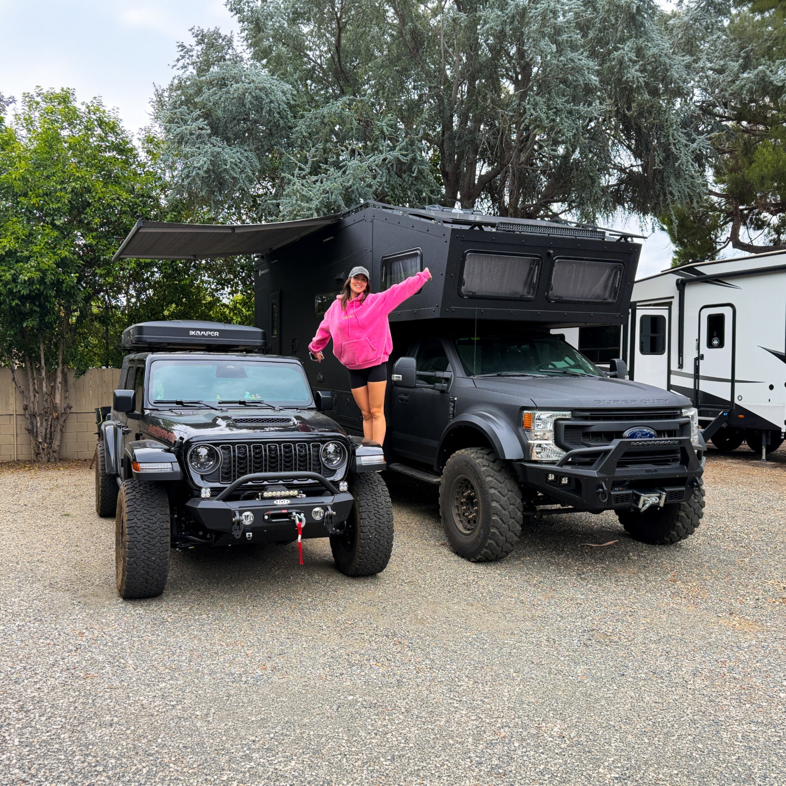 Emma at camp with the Wanderbox and Jeep