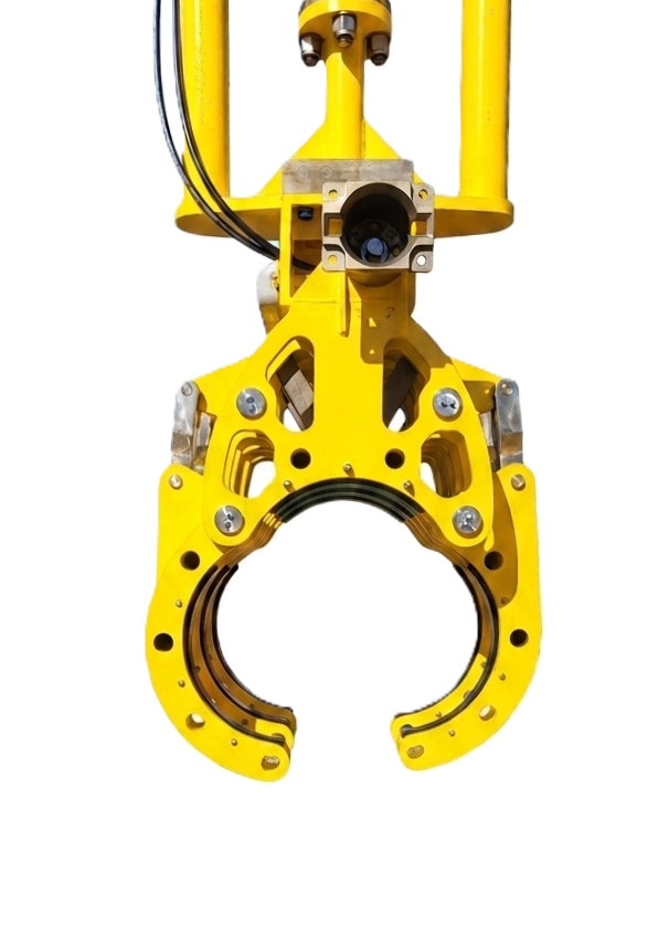 A close-up view of a yellow, mechanical pipe cutting or handling tool with a circular opening and various bolts and structural components, set against a plain background.
