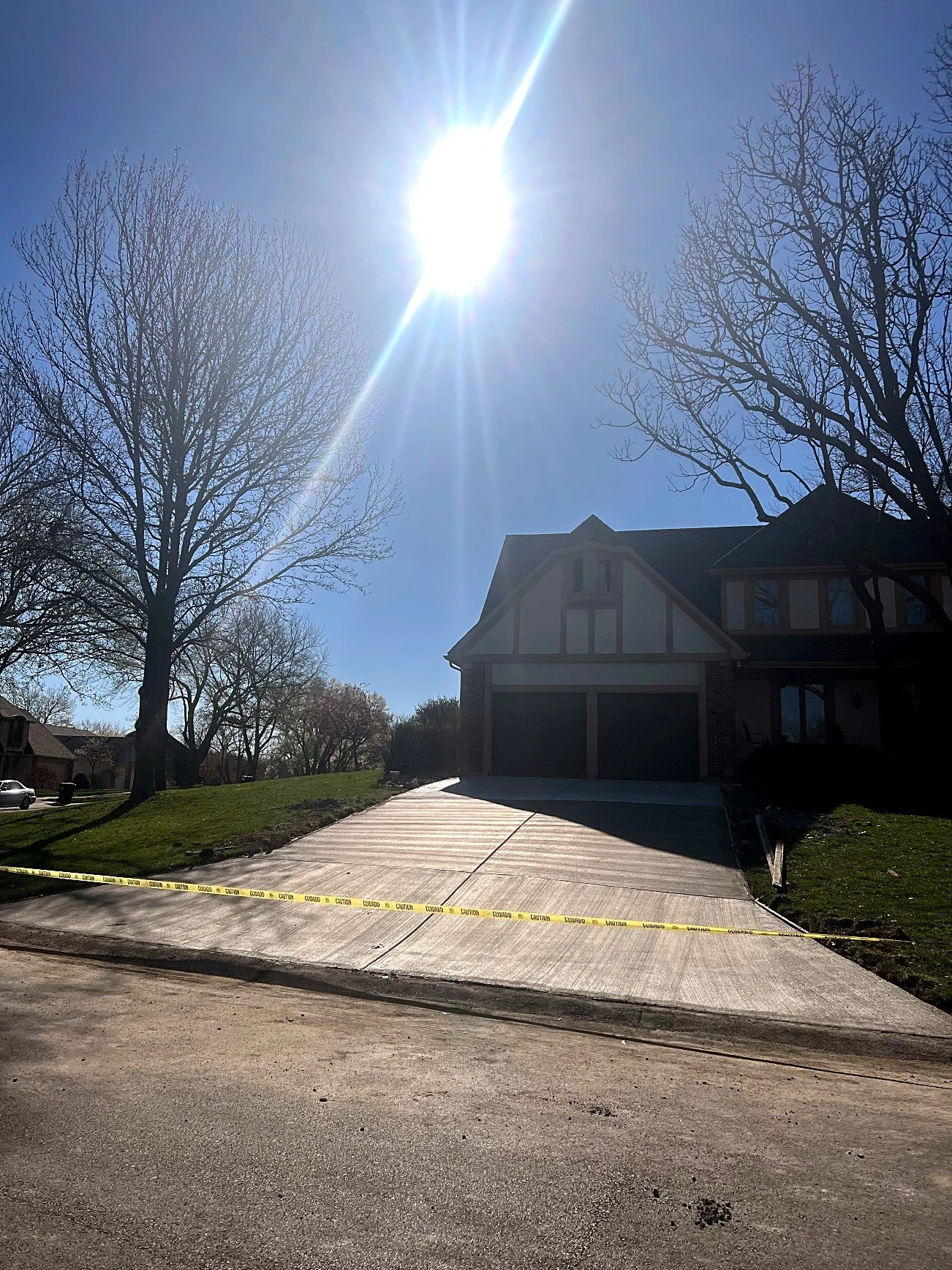 Finished driveway at a Tudor-style home