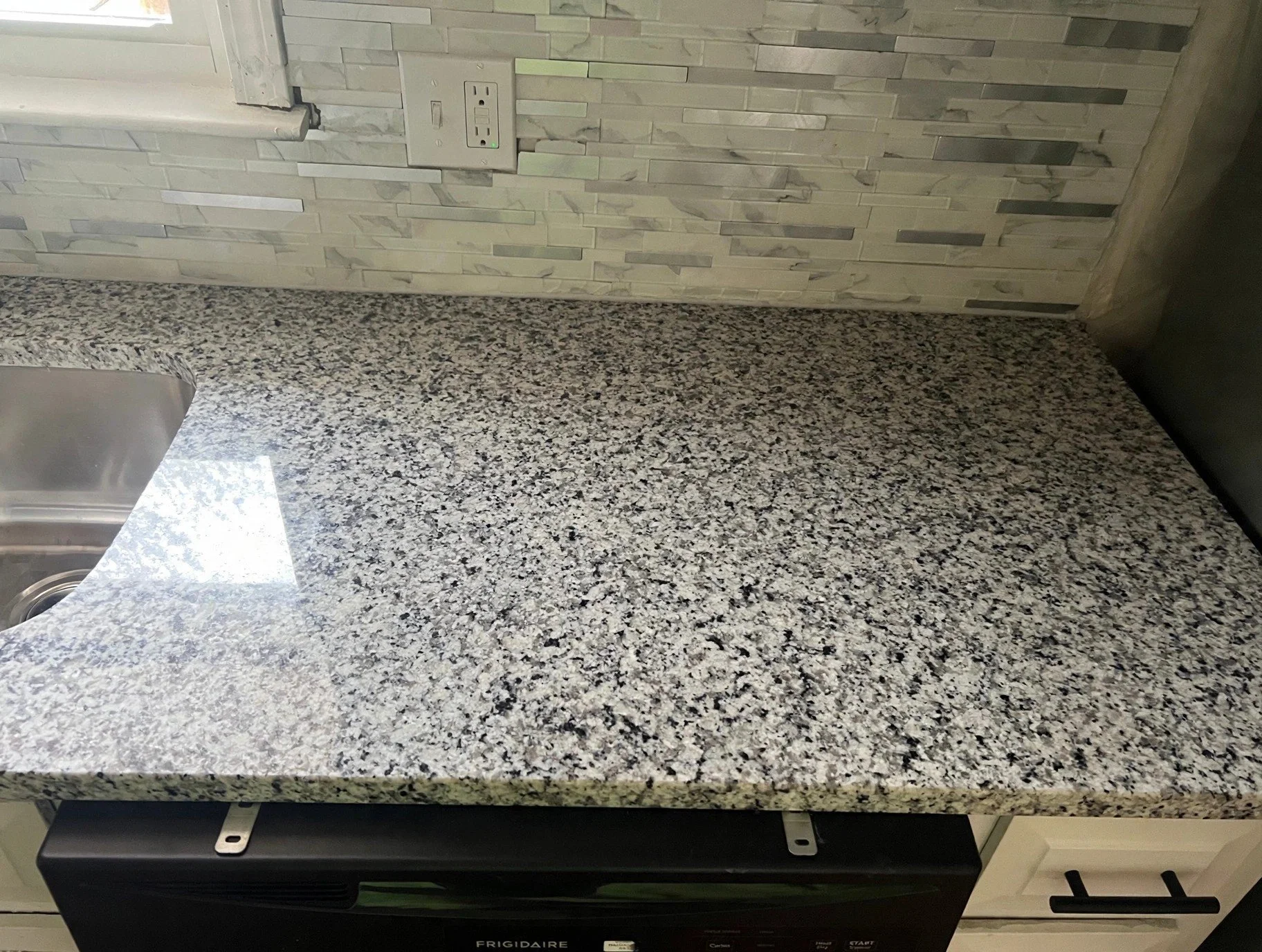 Kitchen — granite counters and sink