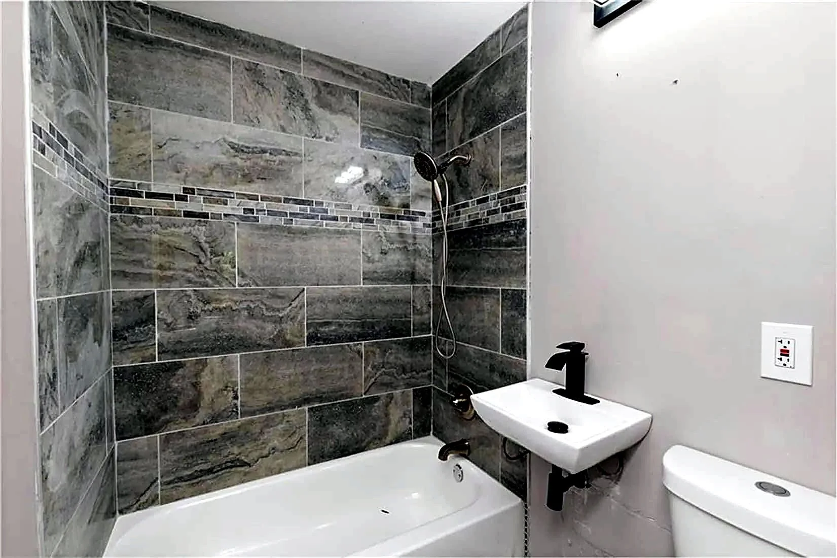 Finished — tub and shower, tiled
