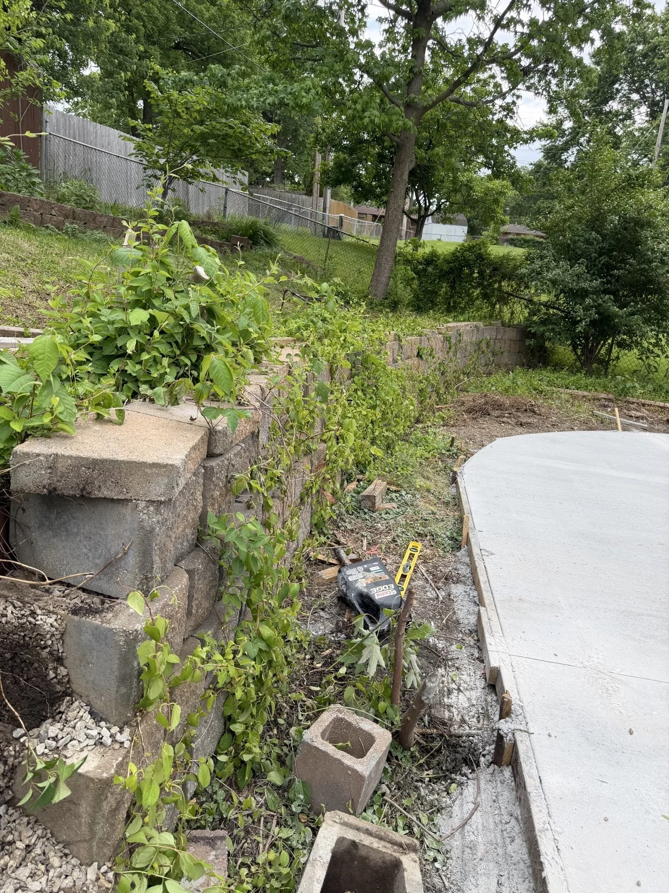 Wall going up beside the new patio