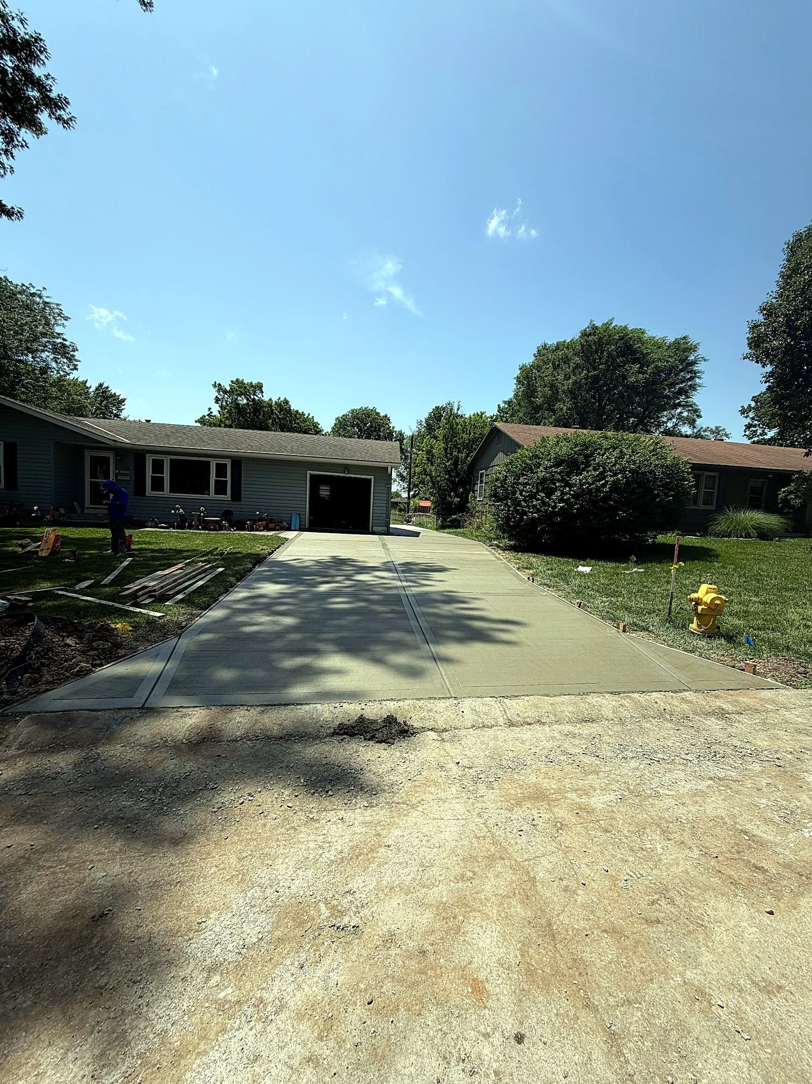 Finished — new concrete driveway