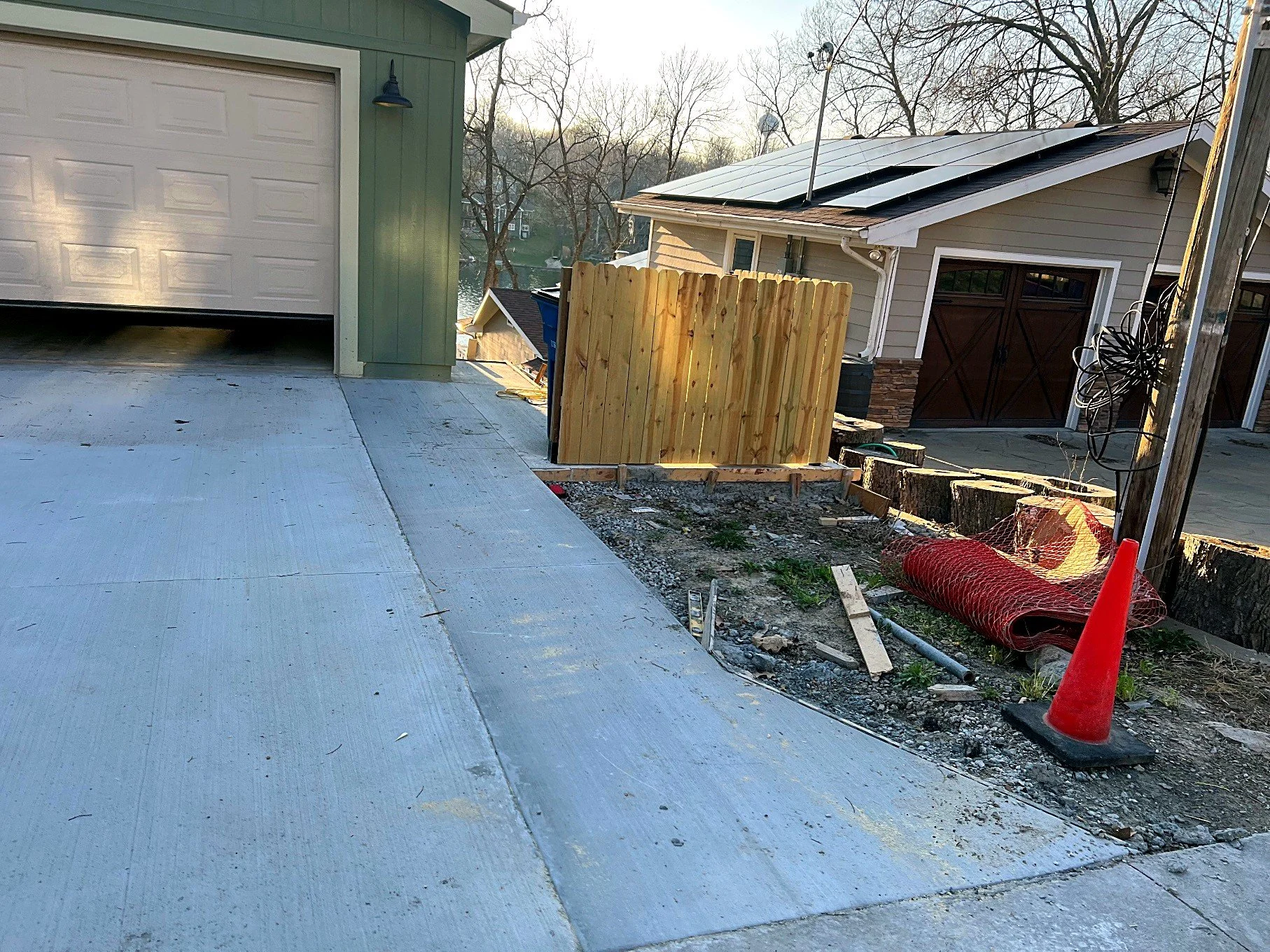 Finished — new driveway and fence