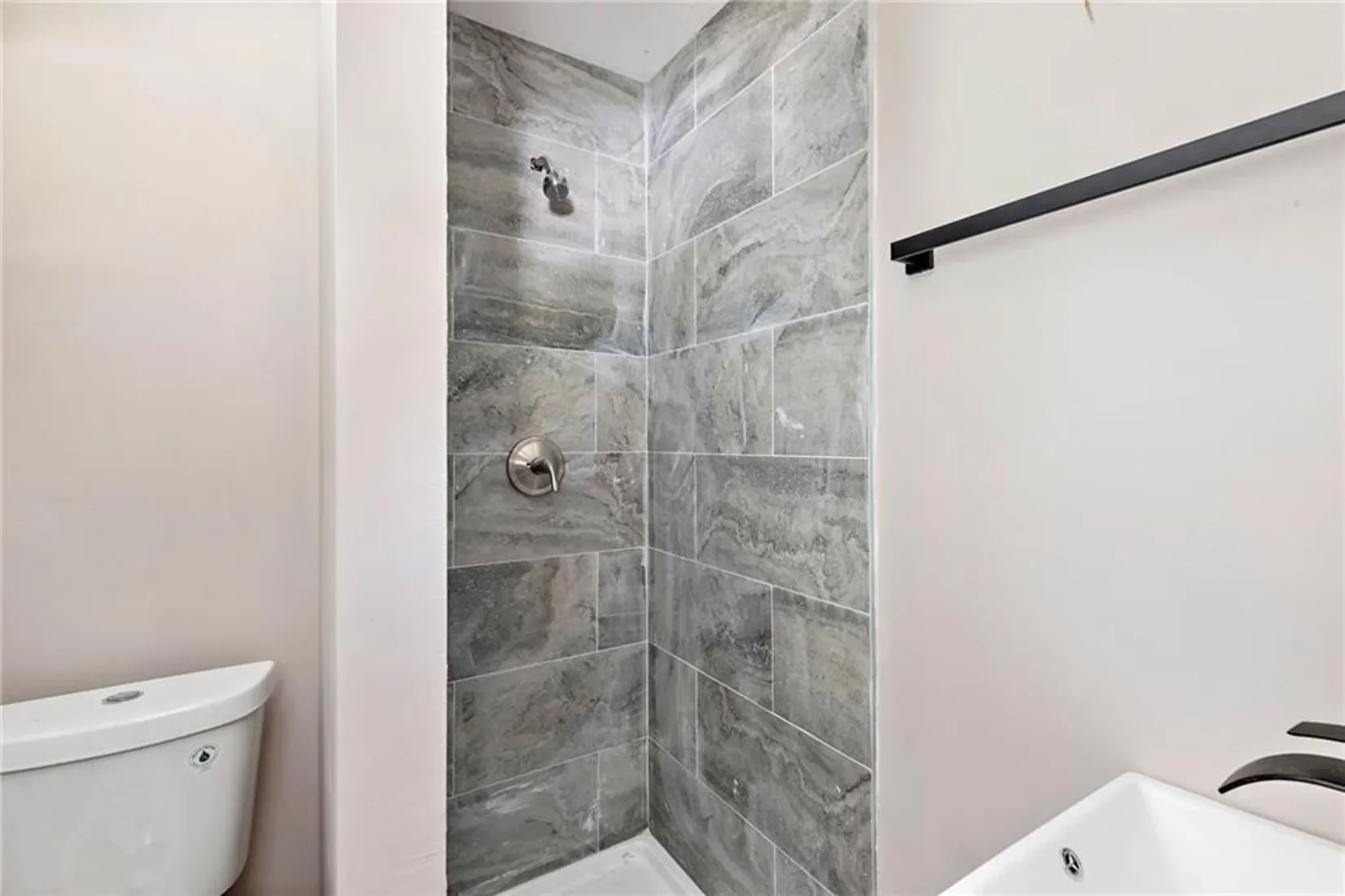 Finished — tiled walk-in shower