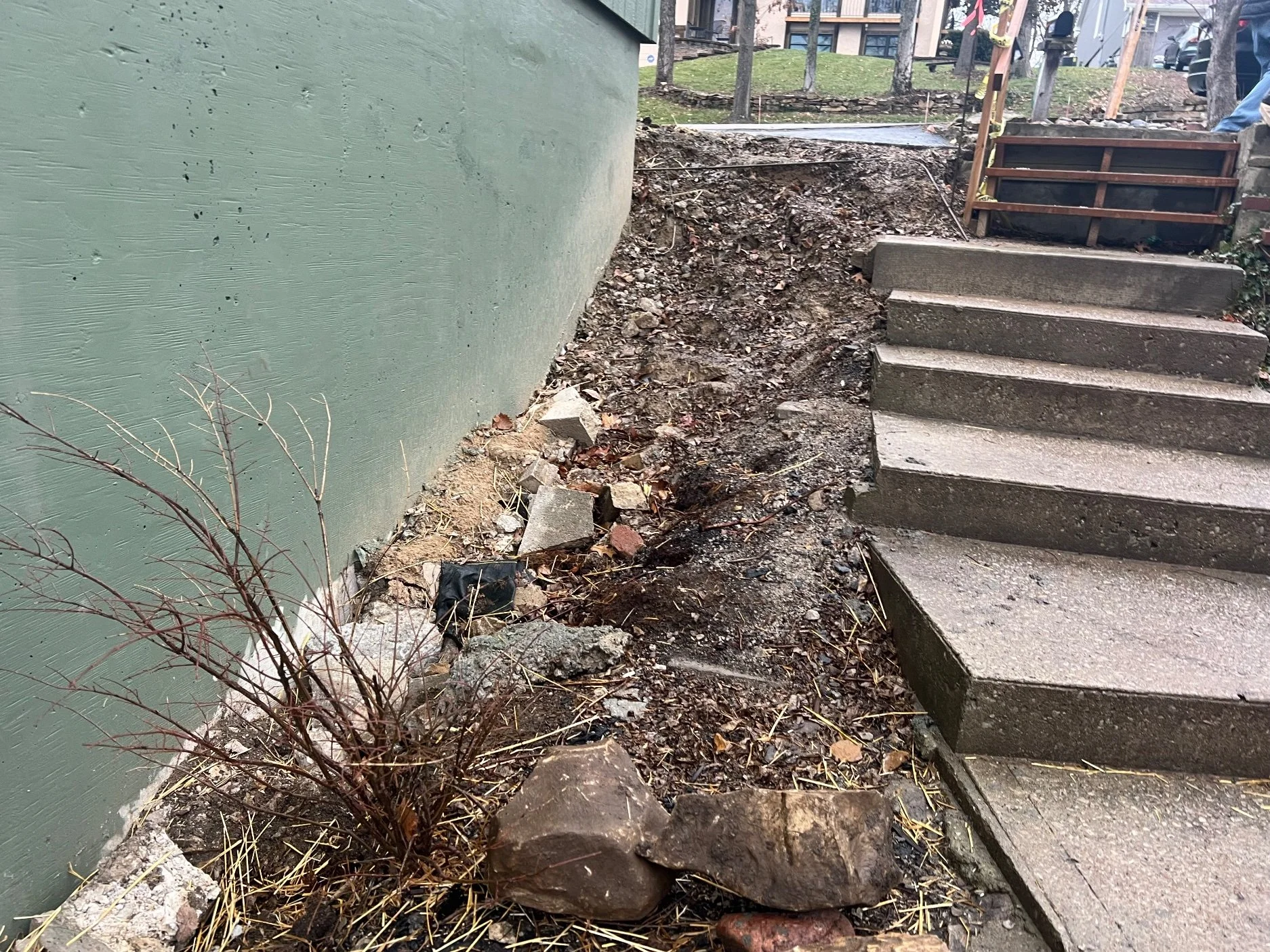 Before — rough ground, old steps