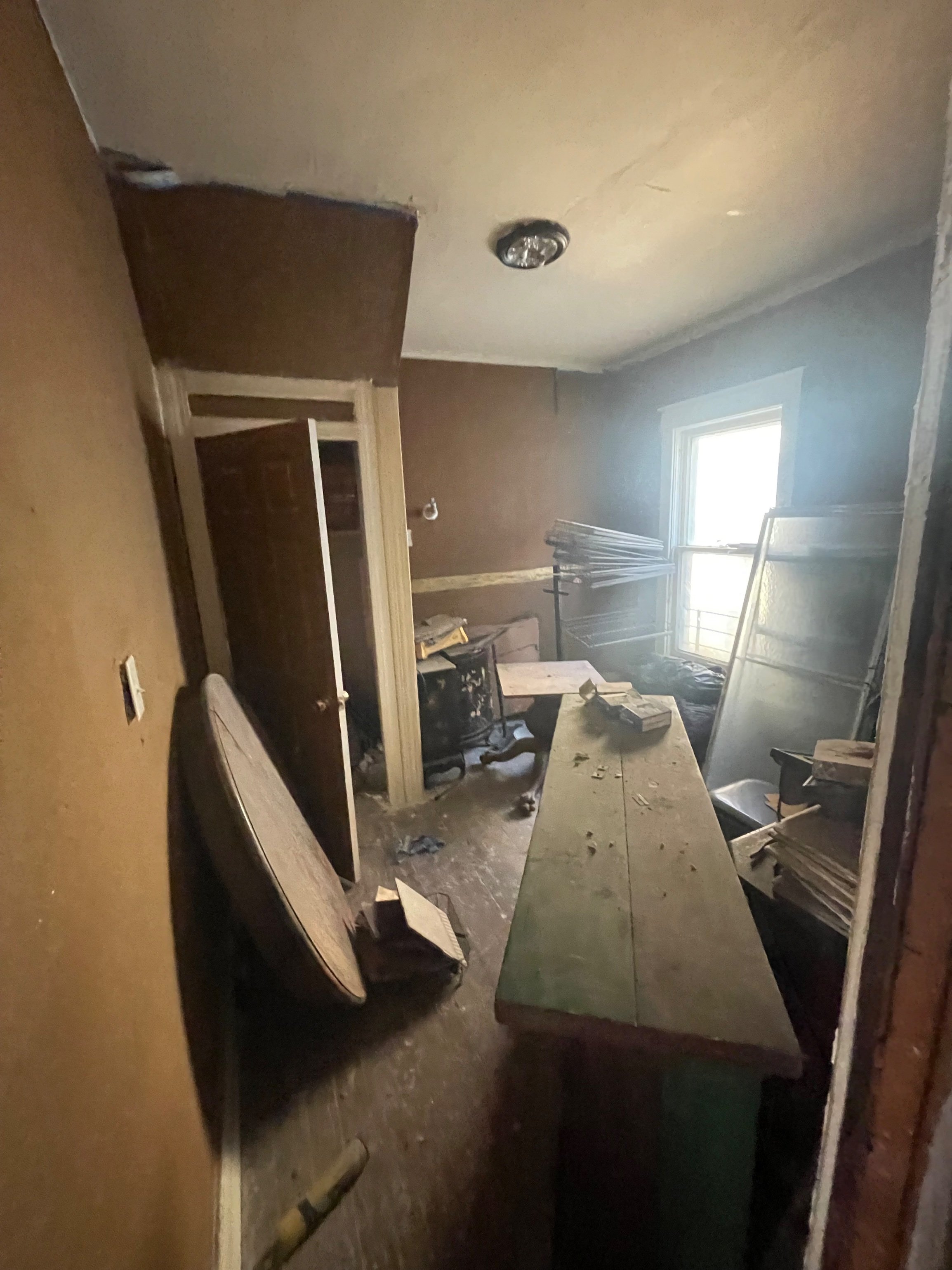 In progress — a room cleared out during demo
