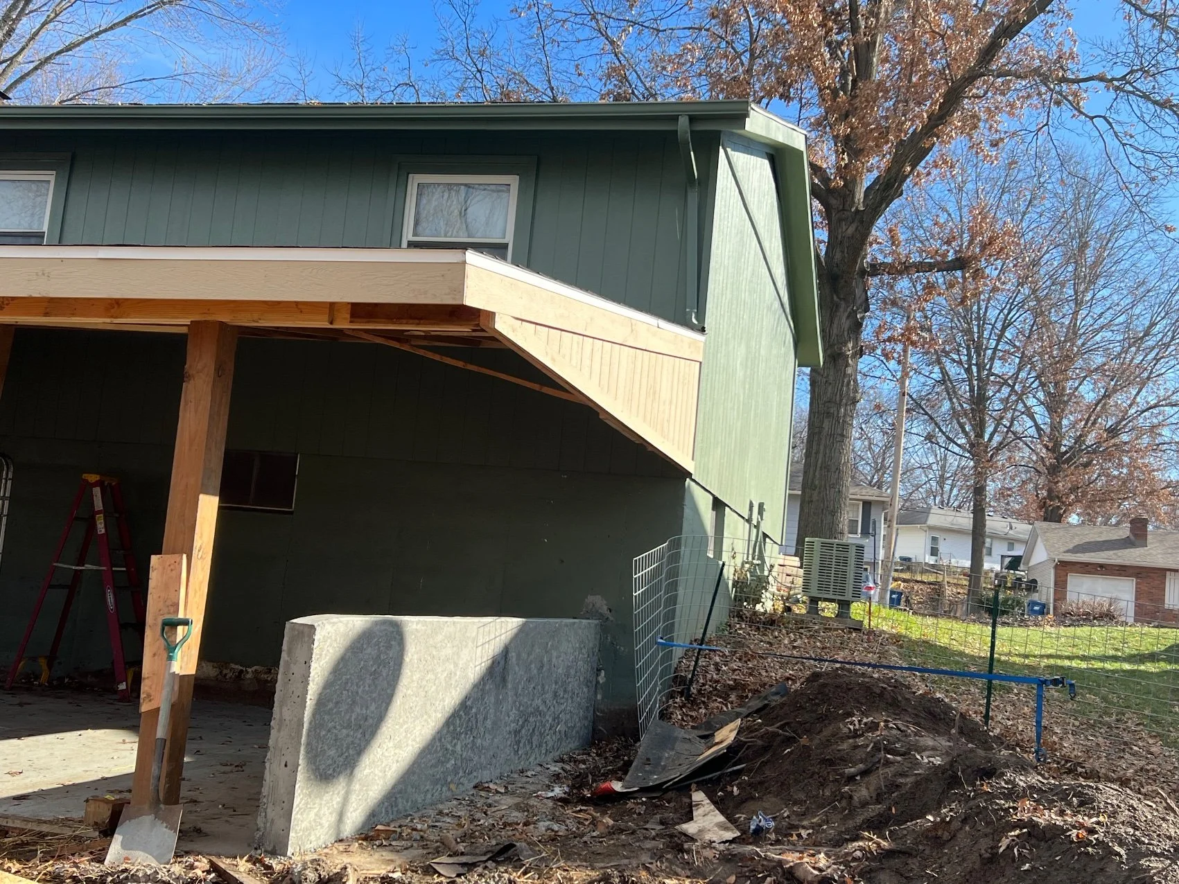 Carport and retaining wall in progress