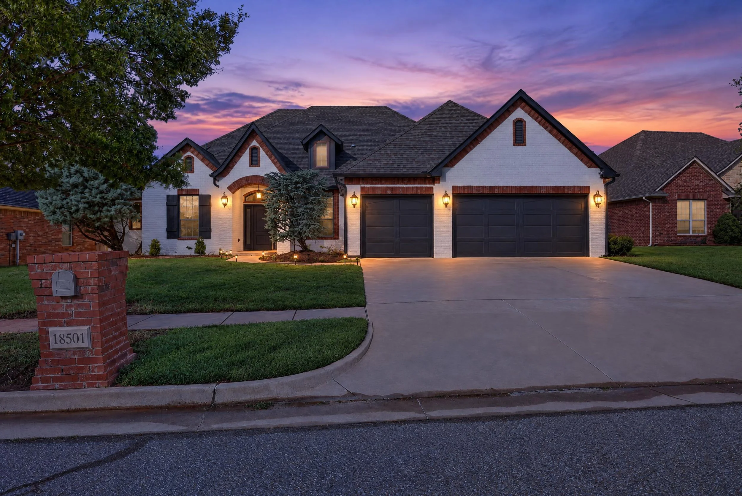 Twilight exterior real estate photography of an Edmond Oklahoma home at dusk