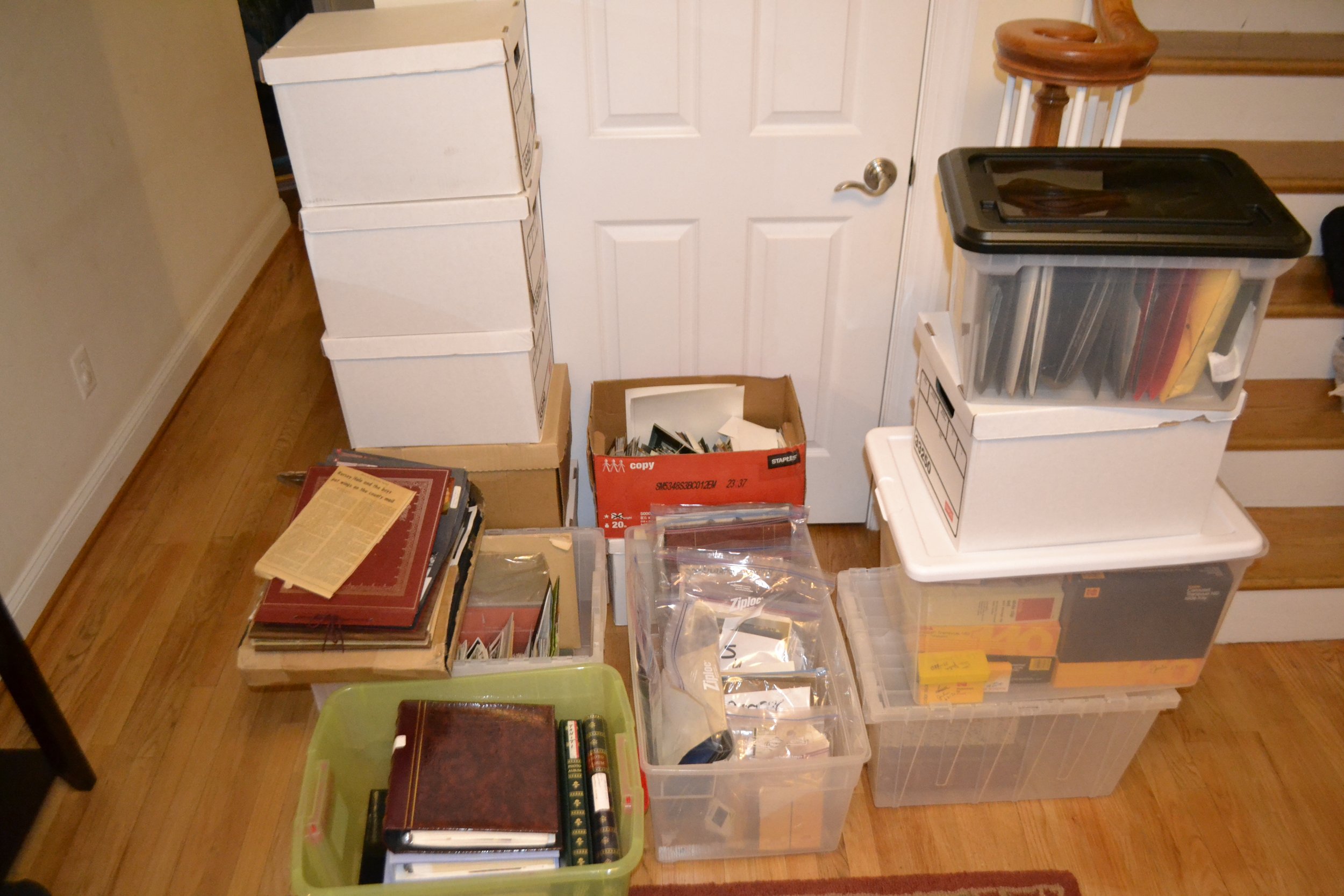 Before: 23 storage boxes of loose prints, old photo albums, 35mm slides and negatives spanning over 100 years.