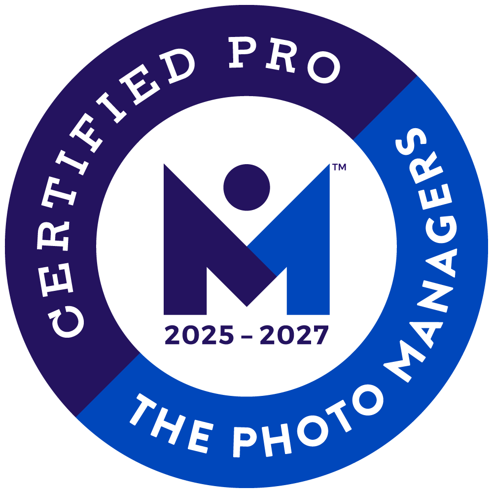 Certified Pro badge with purple, blue, and white colors, featuring a stylized 'M' and the years 2025-2027, surrounded by the text 'The Photo Manages' and 'Certified Pro'.