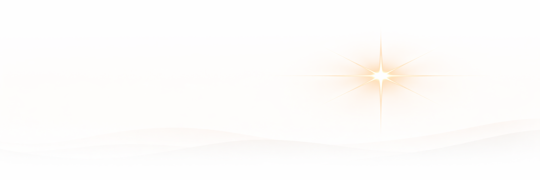Bright glowing star with rays extending outward on a white background.
