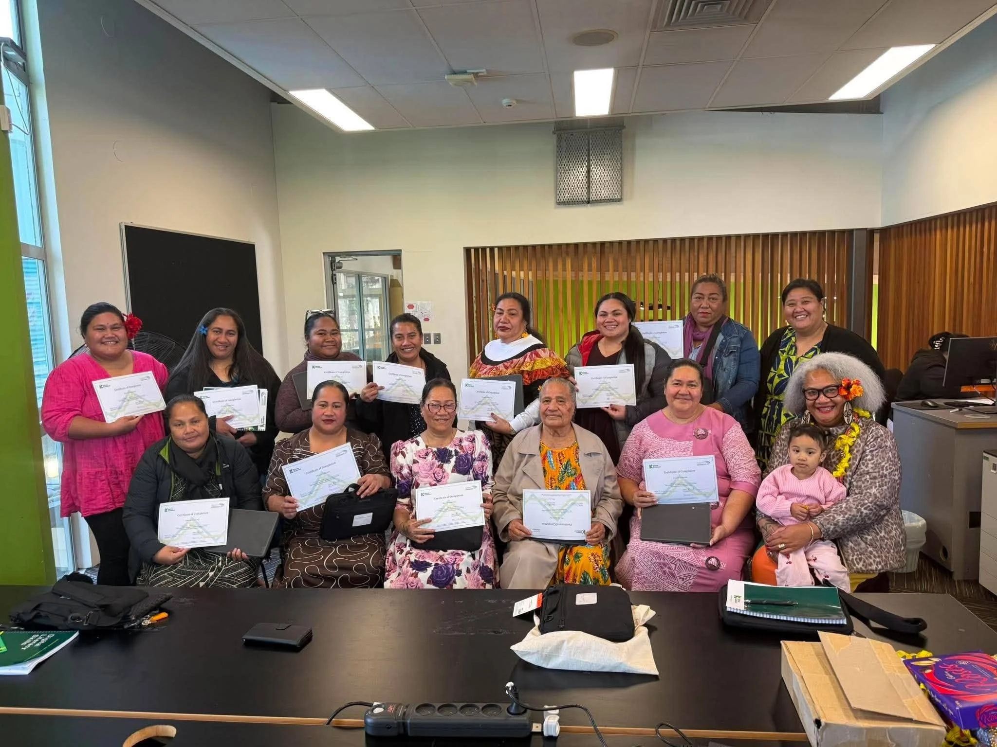 Success Stories: Falelalaga Limited learners proudly displaying their certificates after completing a Katoa Connect Trust digital inclusion programme focused on building digital confidence and skills.
