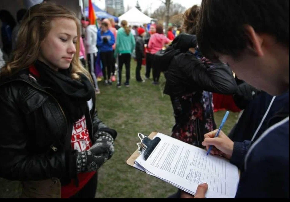 History signing of all healthy canadians petition April 2013.jpg