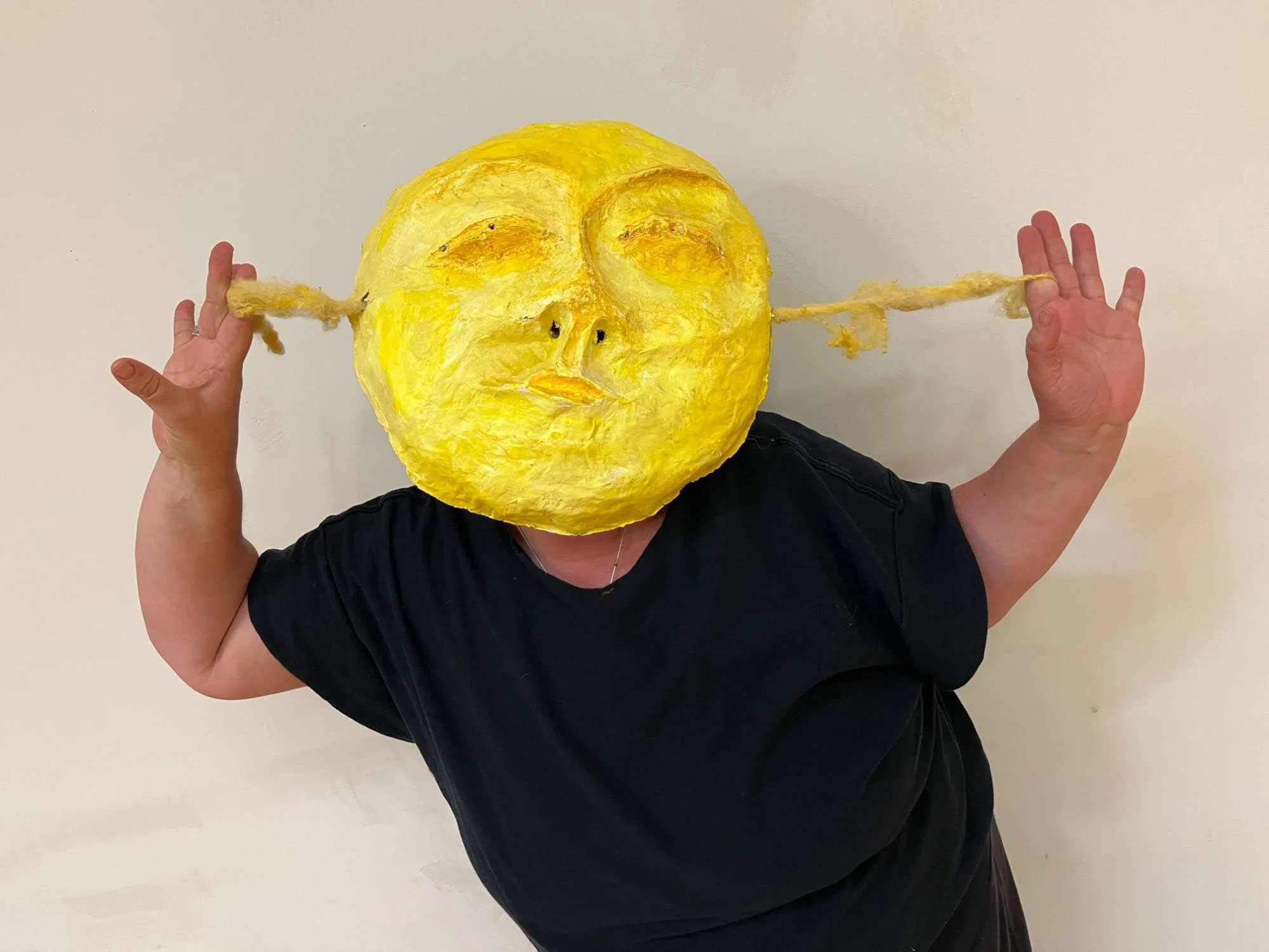 embody-alchemy-masked-woman-sun-face.jpeg