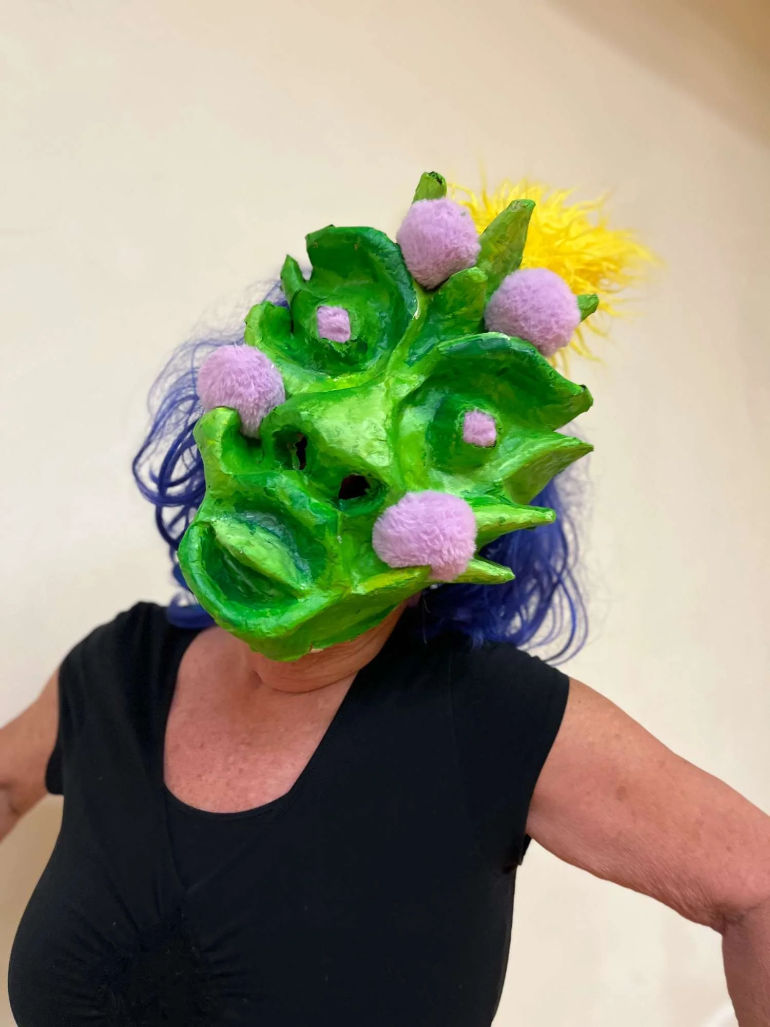 embody-alchemy-green-mask-woman.jpeg