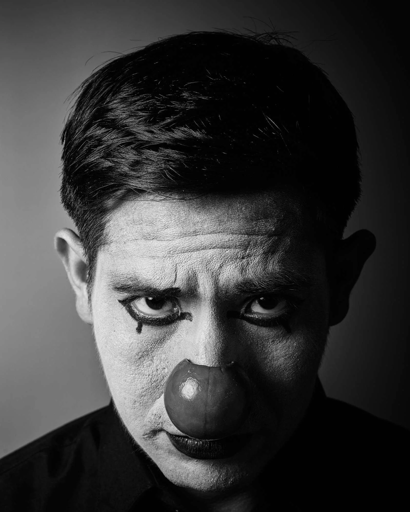 embody-alchemy-clown-man-face-paint-lips-mustache.jpg