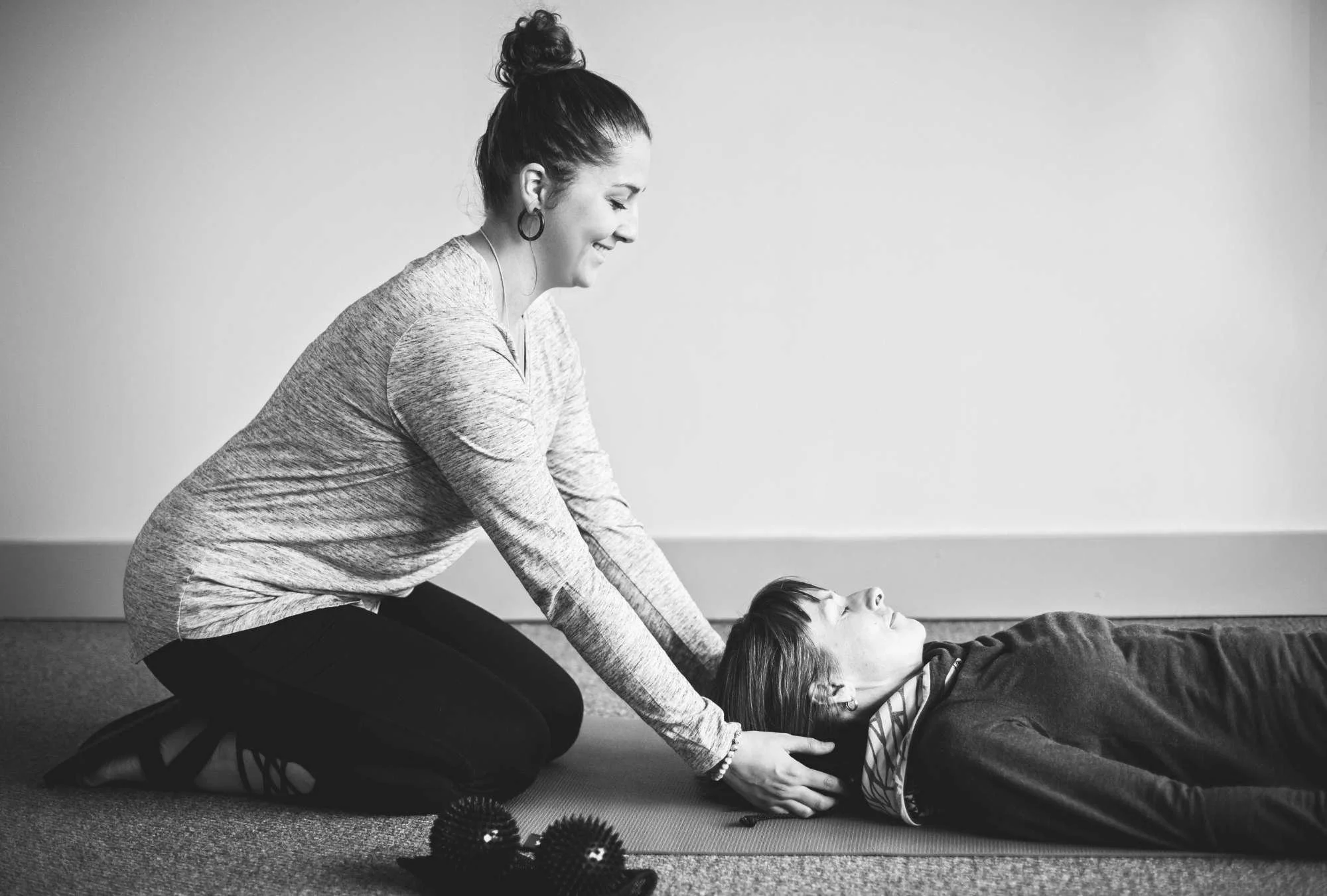 embody-alchemy-woman-stretching-man.jpg