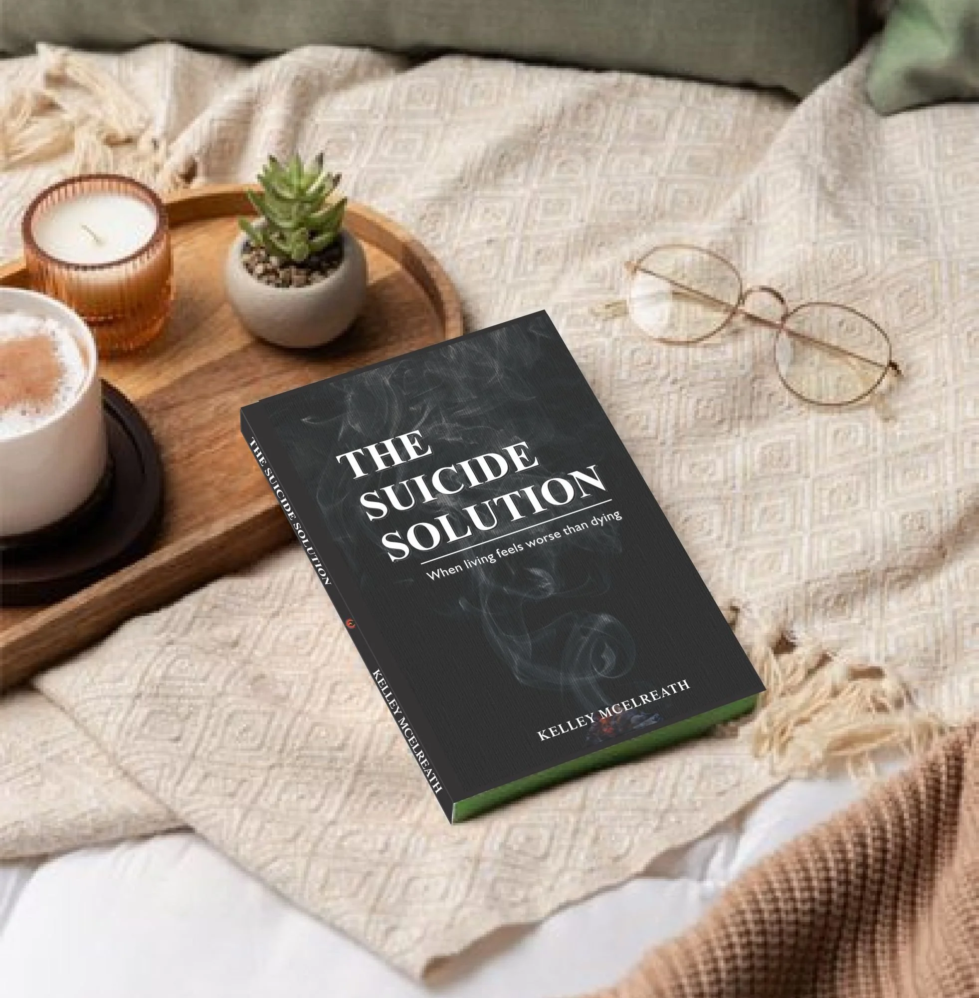 The Suicide Solution book on a table, warm and inviting setting