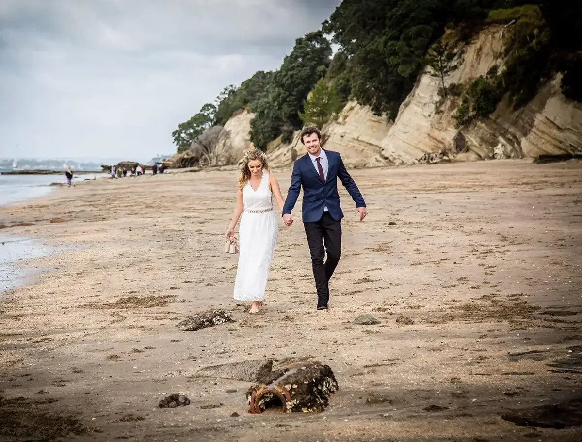 Couple at an intimate beach elopement ceremony