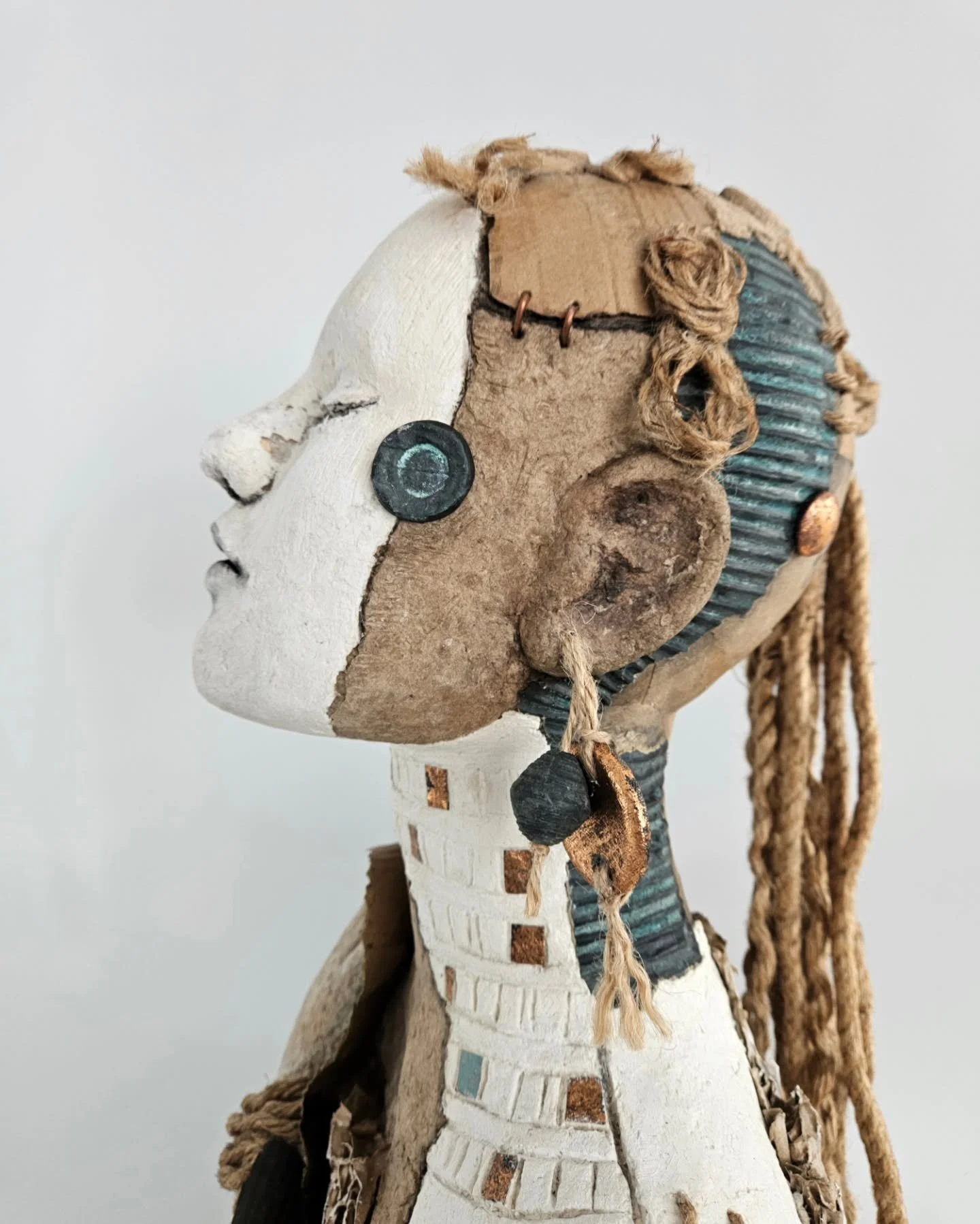 Close up on my latest sculpture 🙂

There's been a lot of cutting, tearing, mashing, squashing, drilling, and gluing involved in bringing her to life, but i'm very happy with how she turned out!

This one started with the question, what if repair was