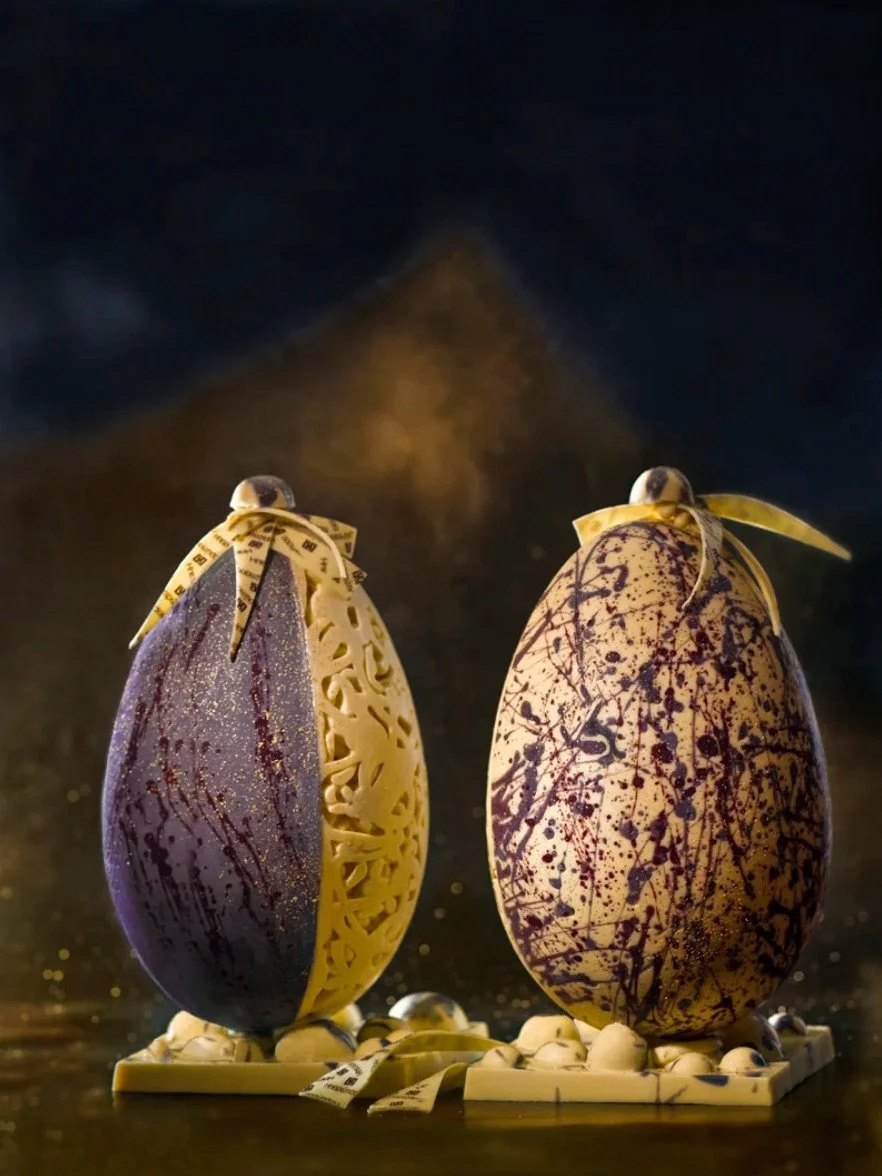 Fine chocolate craftsmanship at Ipirotisa, Vouliagmeni. A dramatic studio capture of artisanal chocolate eggs, highlighting intricate textures and golden details. Photography by Stavros Kostakis.