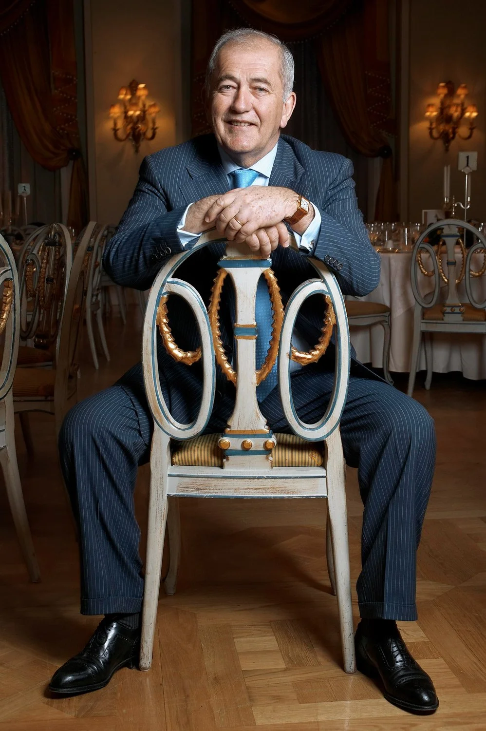 A cross-cultural character study from 2009. Captured at the Hotel Grande Bretagne, this portrait of a French wine ambassador is rendered with a lighting technique reminiscent of English aristocratic portraiture. The balance between the subject's warm