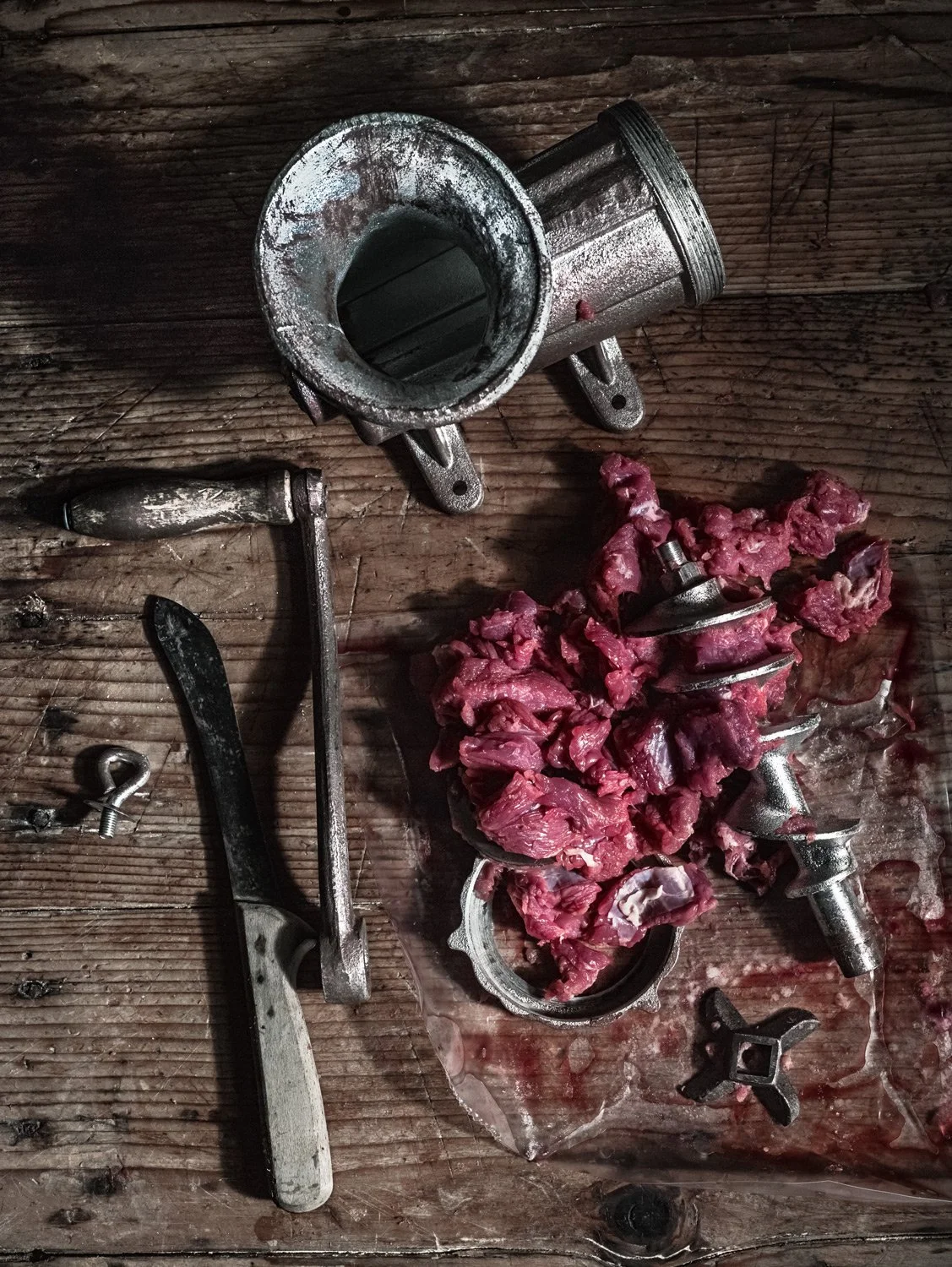 Drakoulis Meat Concept. Where raw textures meet high-end design. A conceptual shoot for Drakoulis Meat, part of the branding strategy by Antonia Skaraki. Stavros Kostakis uses dramatic lighting to highlight the premium nature of the product, creating