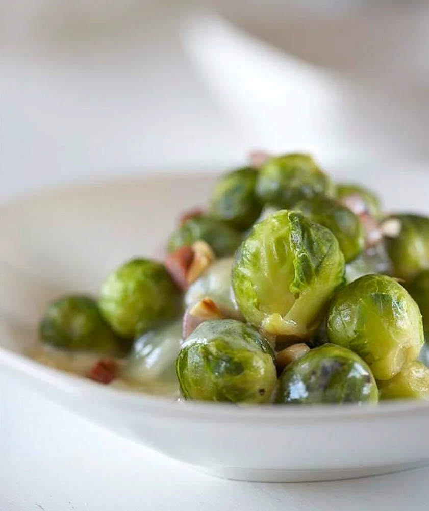 Fresh cooked brussels sprouts with nuts and sauce for Barba Stathis cookbook, photographed by Stavros Kostakis in collaboration with Mousegraphics