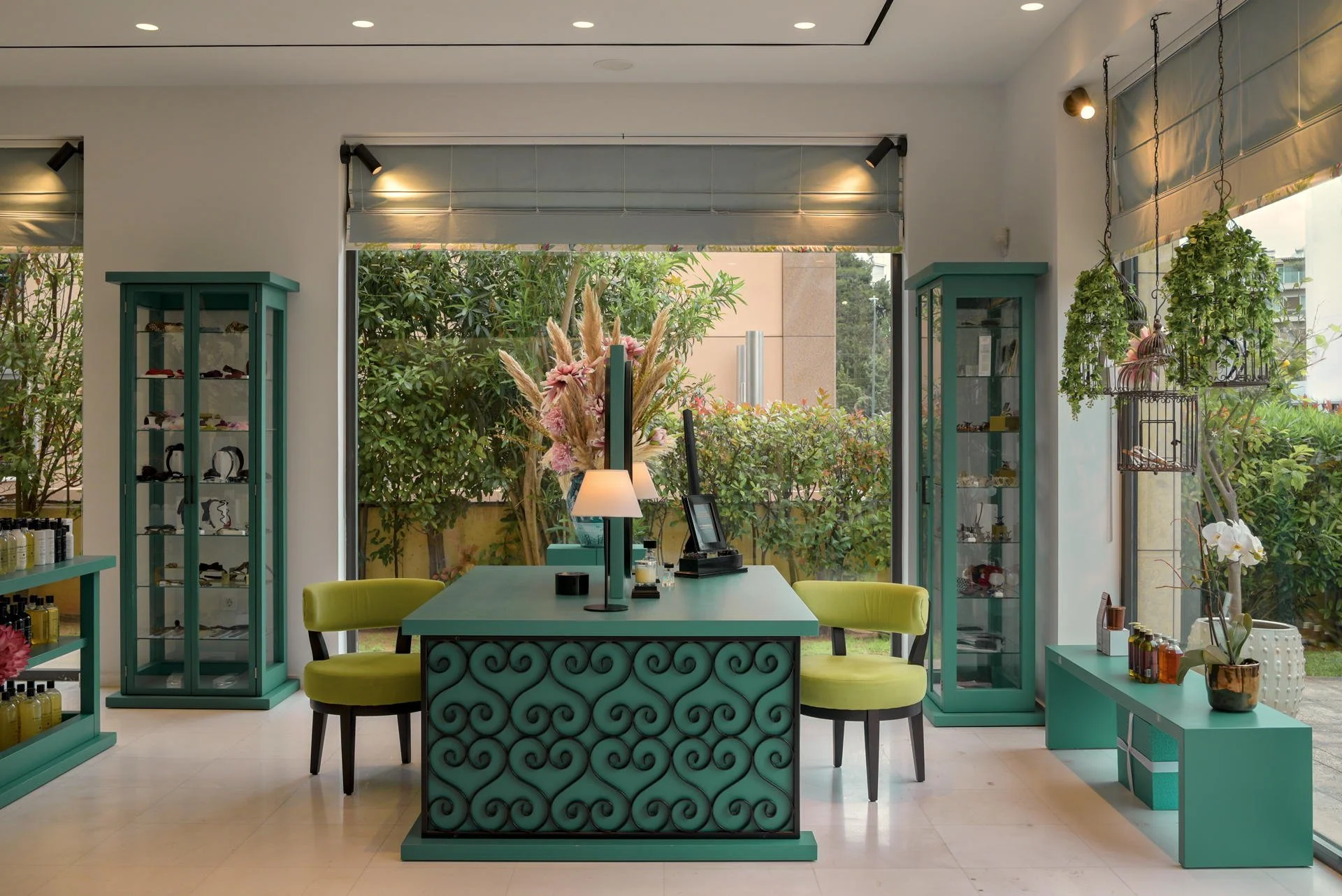 Bespoke teal consultation desk and custom furniture design at Lime & Teal, photographed by Stavros Kostakis Photography.