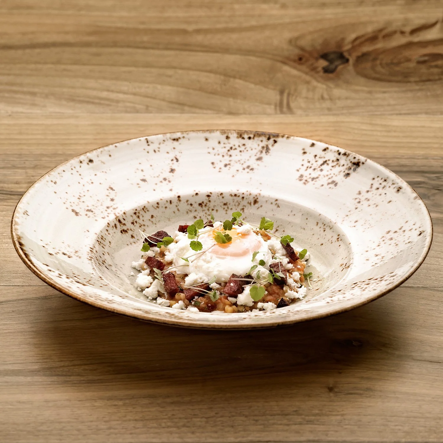 Irodion Capelle Rotterdam. International Gastronomy Projects: A signature dish for Irodion Capelle in Rotterdam. This modern take on traditional Greek frumenty (traxanas) showcases the fusion of authentic ingredients with fine-dining aesthetics. Phot