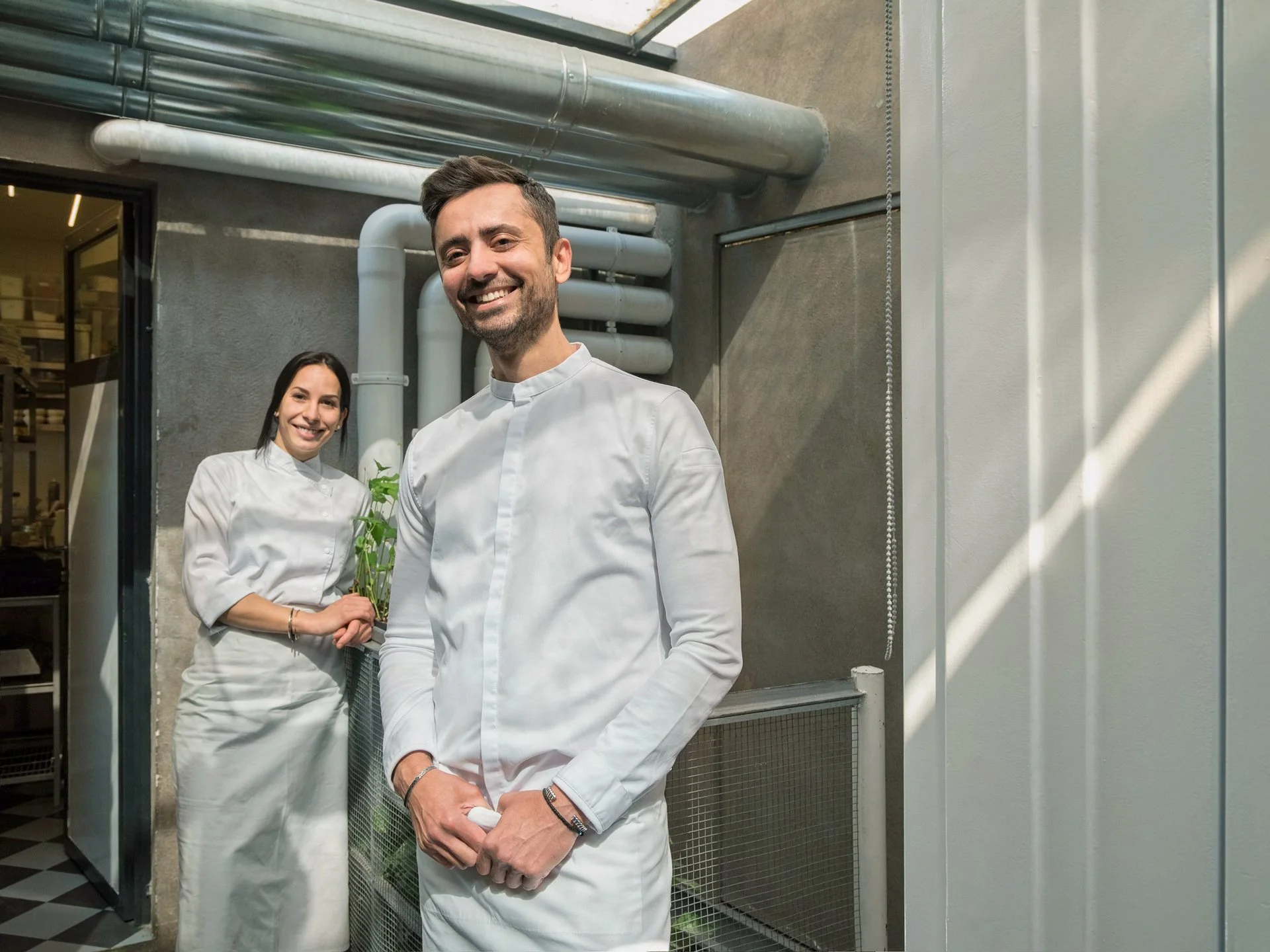 A behind-the-scenes portrait of acclaimed Chef Pavlos Kiriakis alongside his talented pastry chef. This image captures the essence of contemporary Greek fine dining—clean, professional, and focused. Part of the culinary visual curation series by Stav