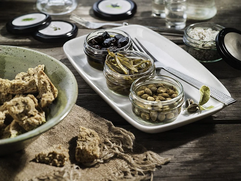 Mastihashop tratitional meze appetazer  product on wooden table moody photography Stavros Kostakis