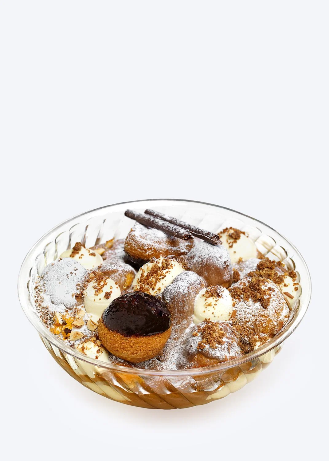 Professional commercial packshot of a chocolate profiterole on a white background for Nikolas Koulepis Patisserie Brussels, by food photographer Stavros Kostakis.