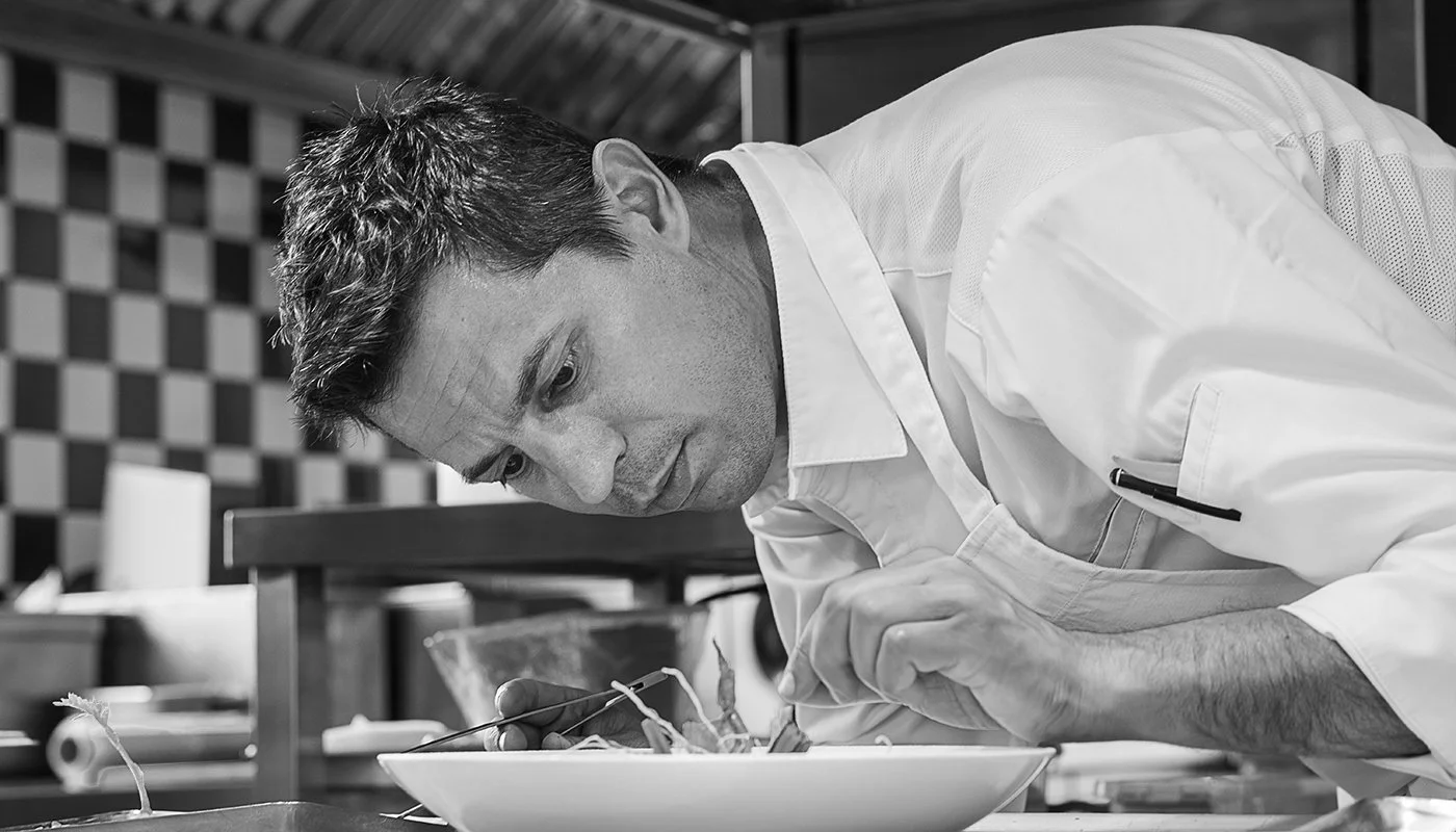 black and white on work chef portrait ,last check on plate