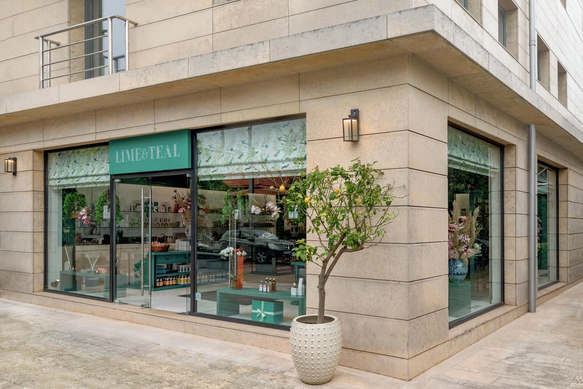 Exterior architectural photography of Lime & Teal perfume bar storefront by Stavros Kostakis Photography for Kyparissou Architects.