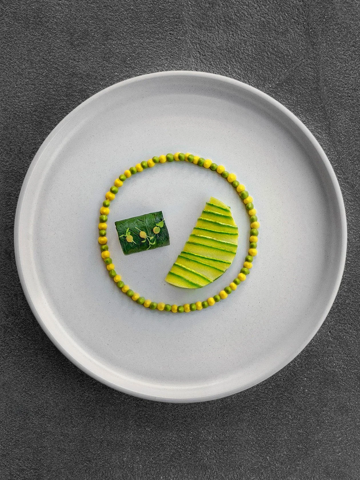 Minimalist culinary art by Michelin-star Chef Pavlos Kyriakis at The Zillers, Athens. Captured for FNL Guide, highlighting the precision of modern Greek gastronomy through geometric plating and natural textures. Photography by Stavros Kostakis.