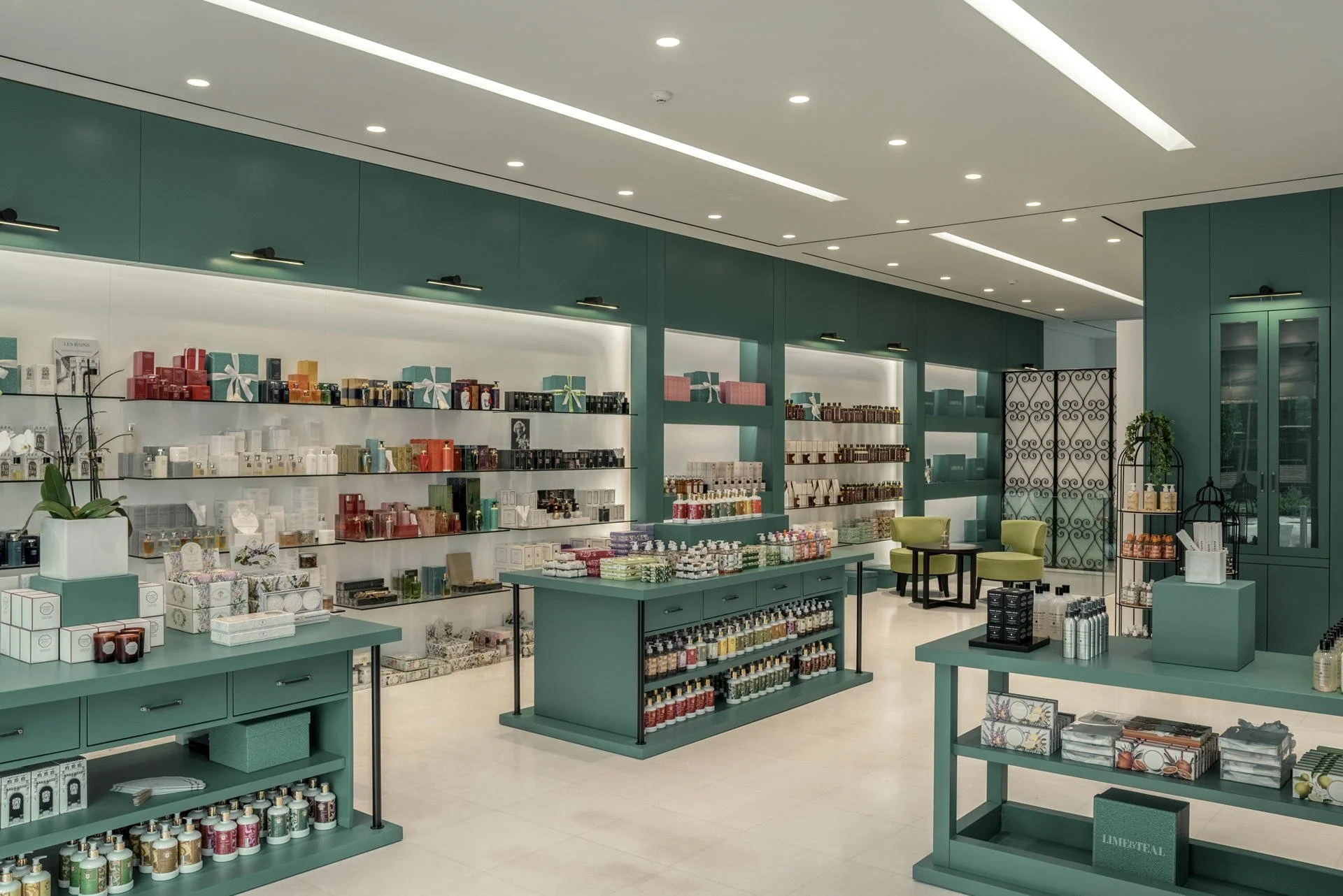 Comprehensive view of the niche product display units and custom furniture layout by Stavros Kostakis Photography.