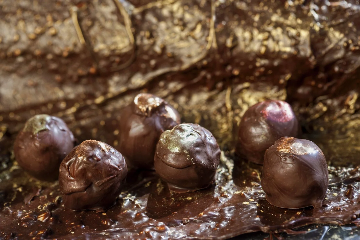 Professional food photography assignment by Stavros Kostakis, showcasing Mina Apostolidis signature truffles with high-contrast, brutalist lighting
