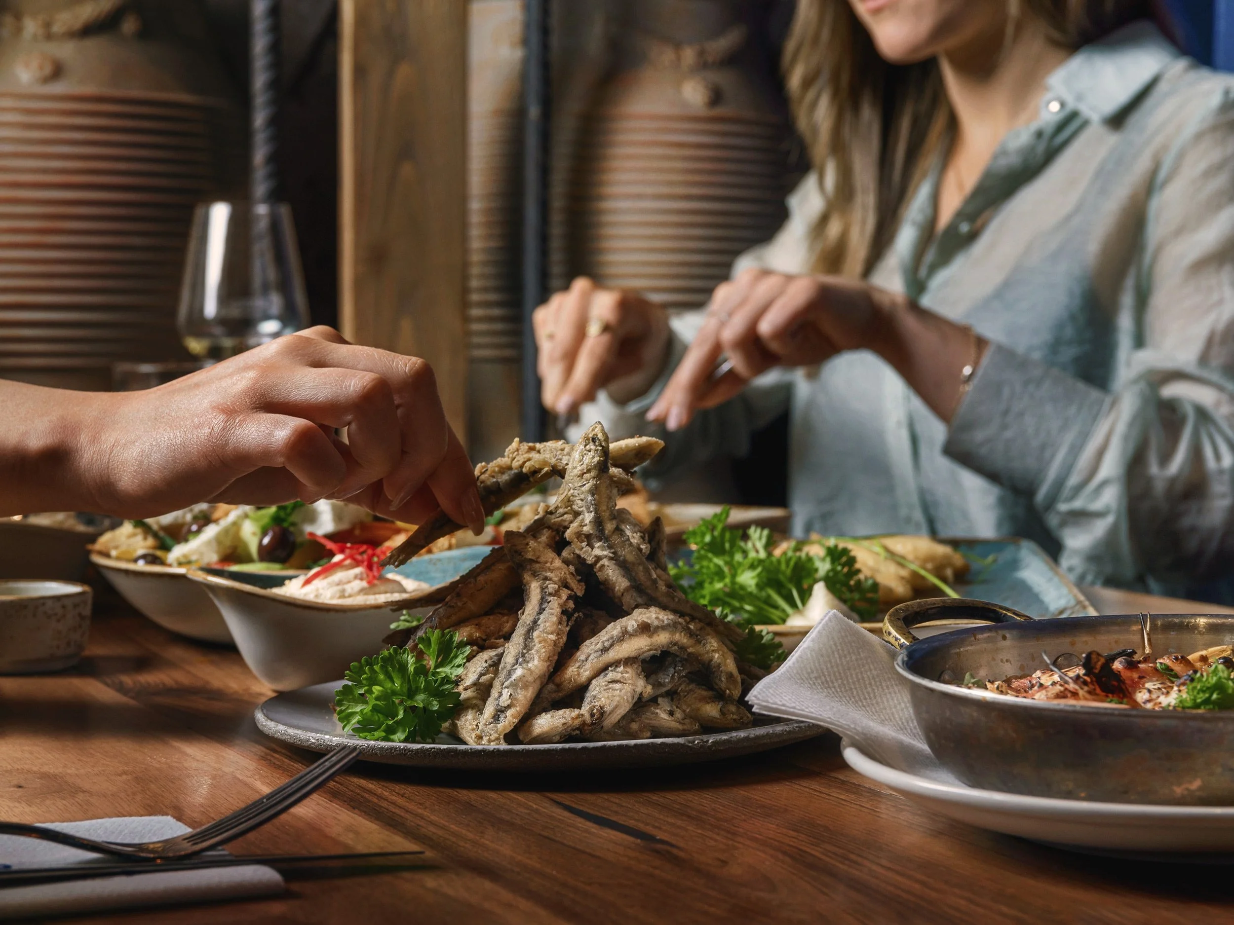 Authentic Greek culinary tradition and hospitality at Irodion Capelle, Rotterdam. Lifestyle photography by Stavros Kostakis.