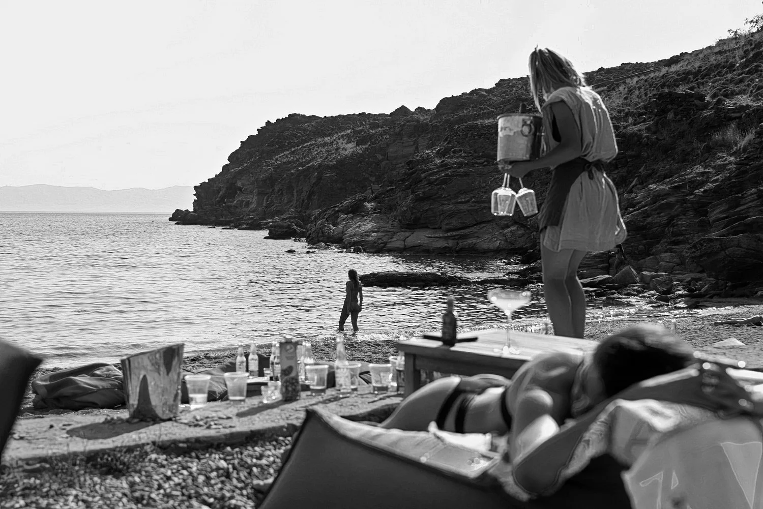 B&W documentary photography of Vourni beach at Bianco Tinos, 1960s cinematic aesthetic by Stavros Kostakis.