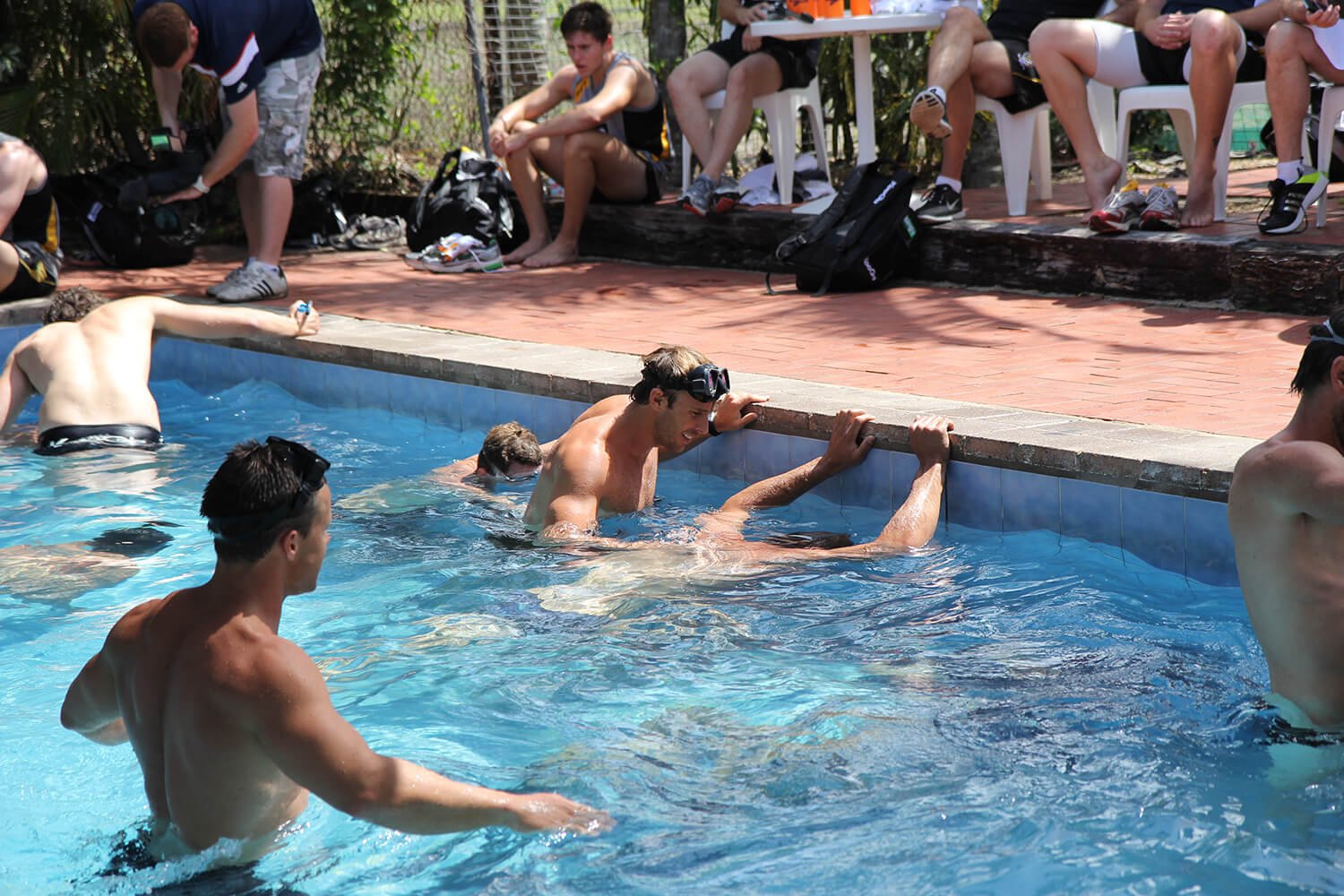 Mark Visser coaching Richmond Tigers players during breath-hold pool training at pre-season camp